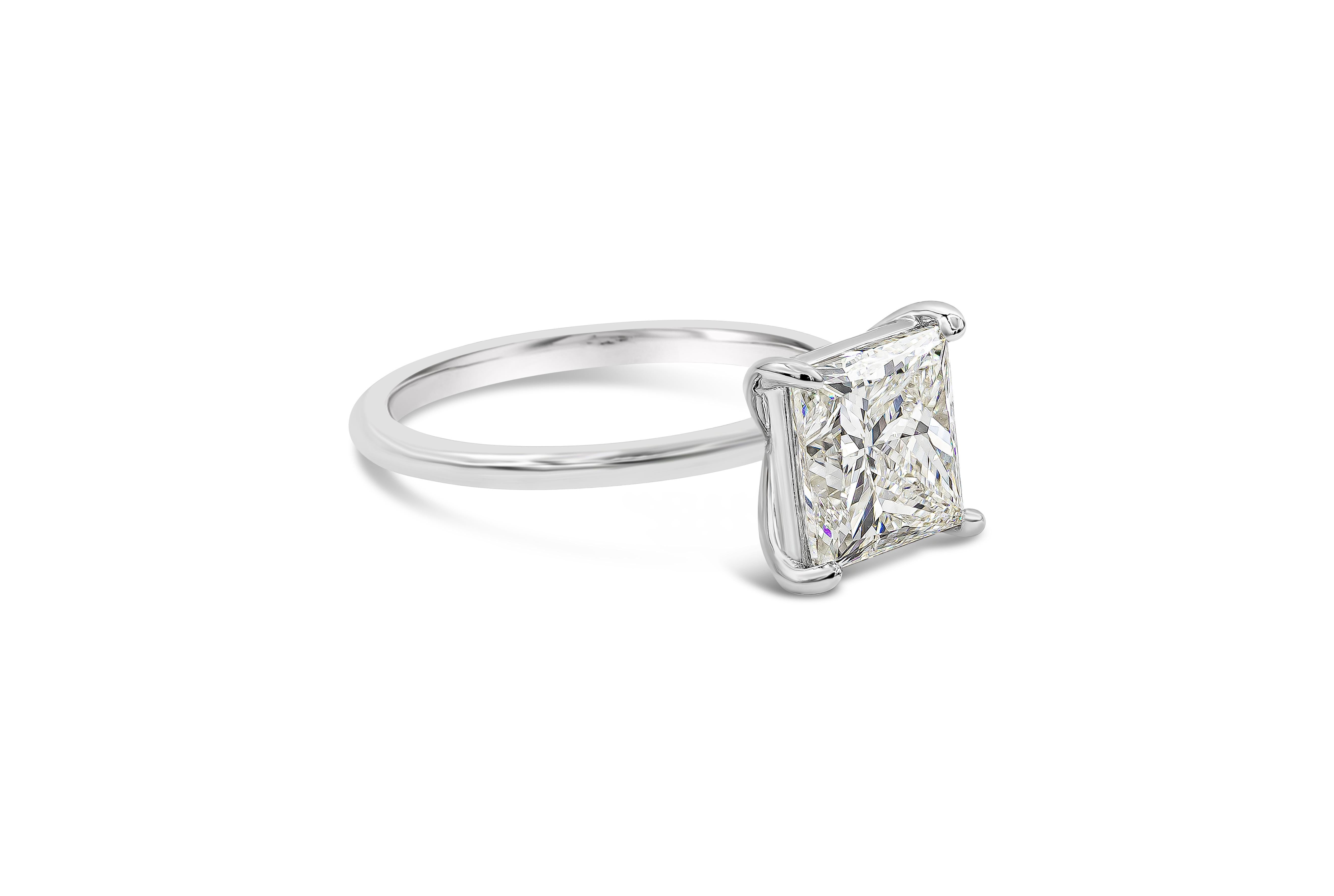 A timeless solitaire engagement ring style. Features a 3.06 carat princess cut diamond certified by GIA as I color, VS1 clarity, set in a classic four-prong mounting made in platinum. Size 6.5 US.

Style available in different price ranges. Prices