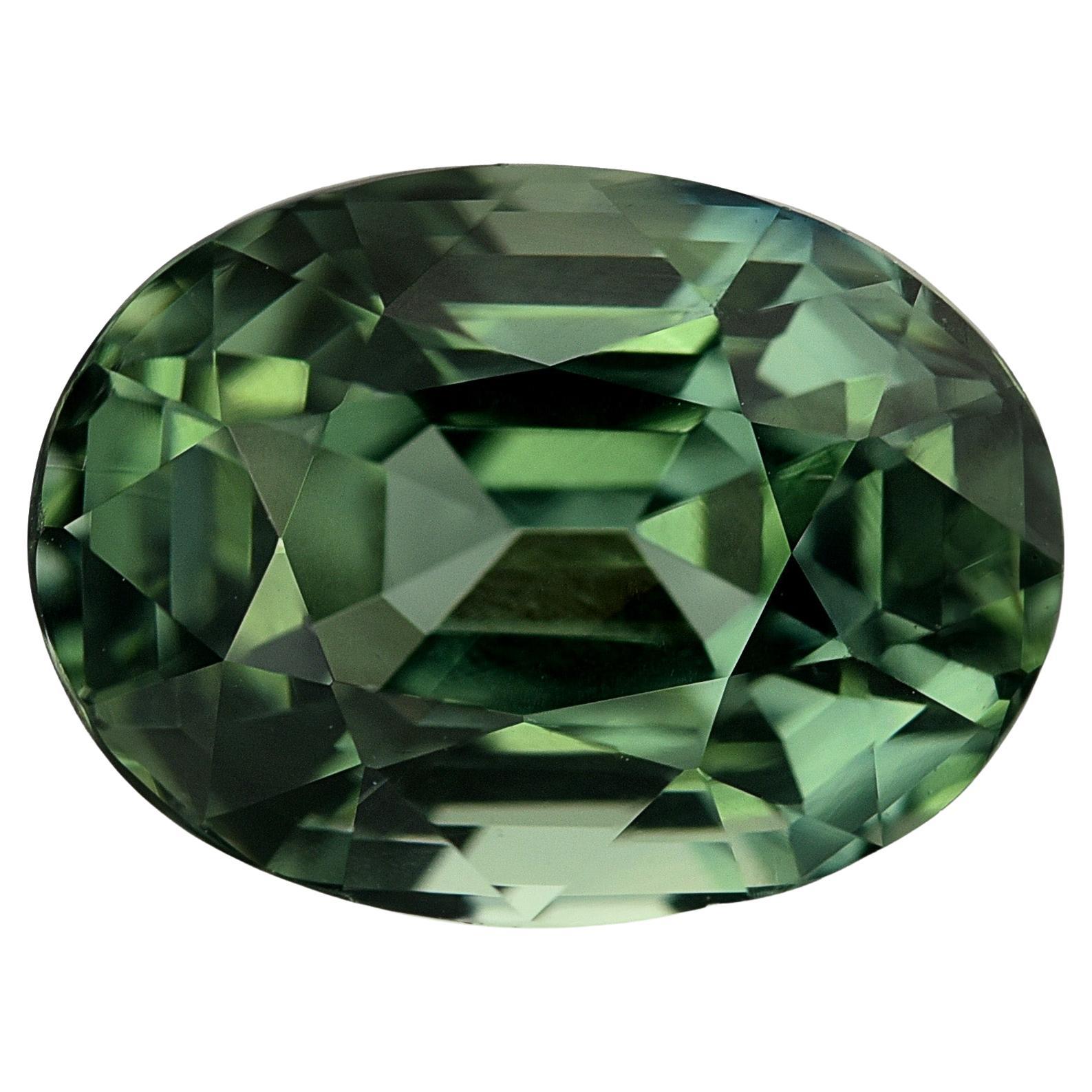 GIA Certified 3.06 Carats Blue Green Sapphire For Sale