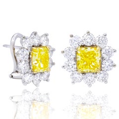 GIA Certified 3.06 Carat Fancy Yellow Diamond Stud Earrings
