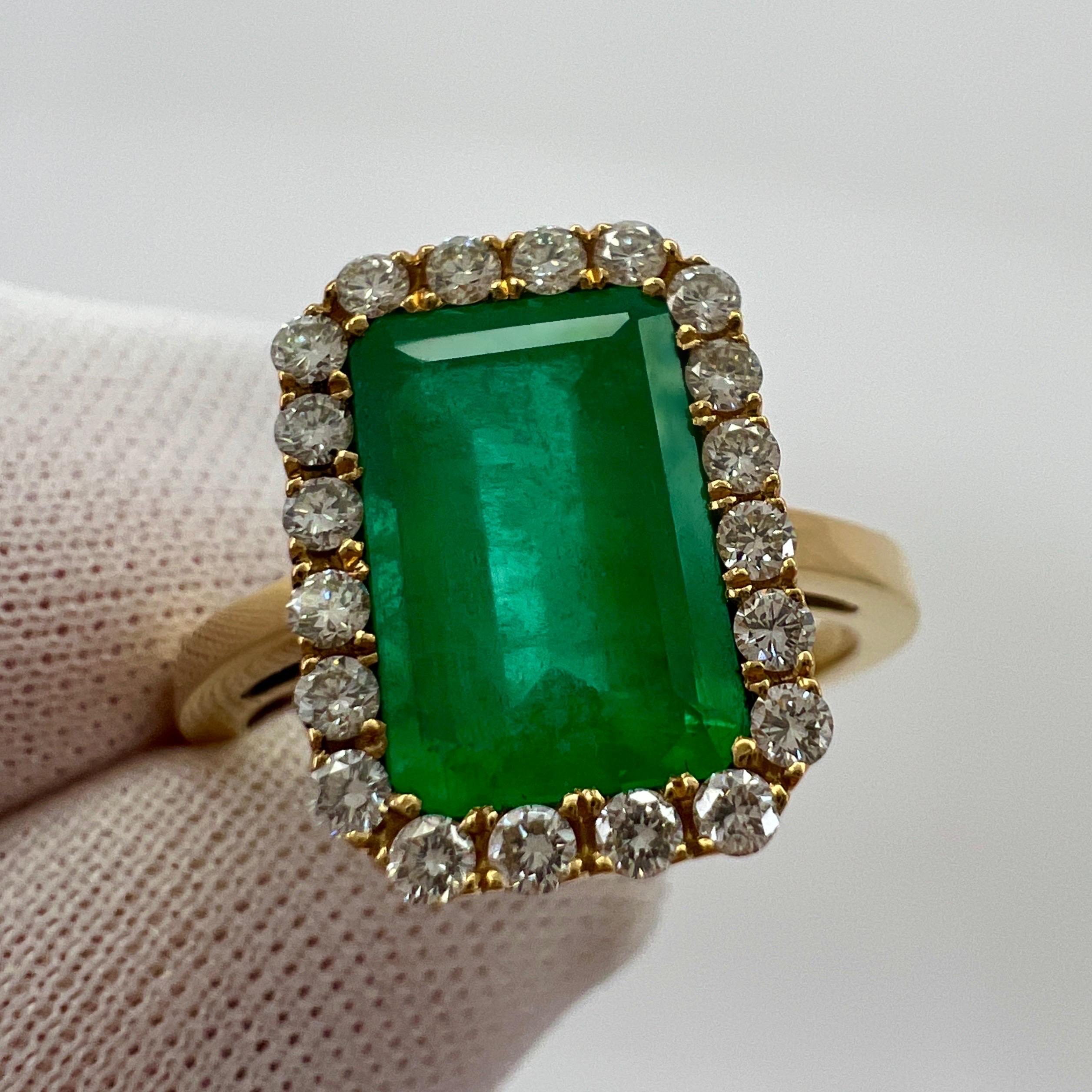 Emerald Cut Gia Certified 3.06 Carat Colombian Emerald & Diamond 18k Yellow Gold Halo Ring