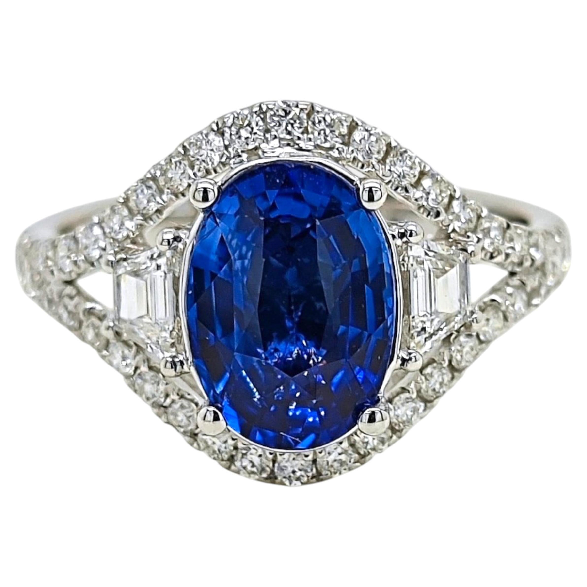 Bague en or blanc sertie d'un saphir de 3.07 carats certifié par le GIA et d'un diamant « Fancy »
