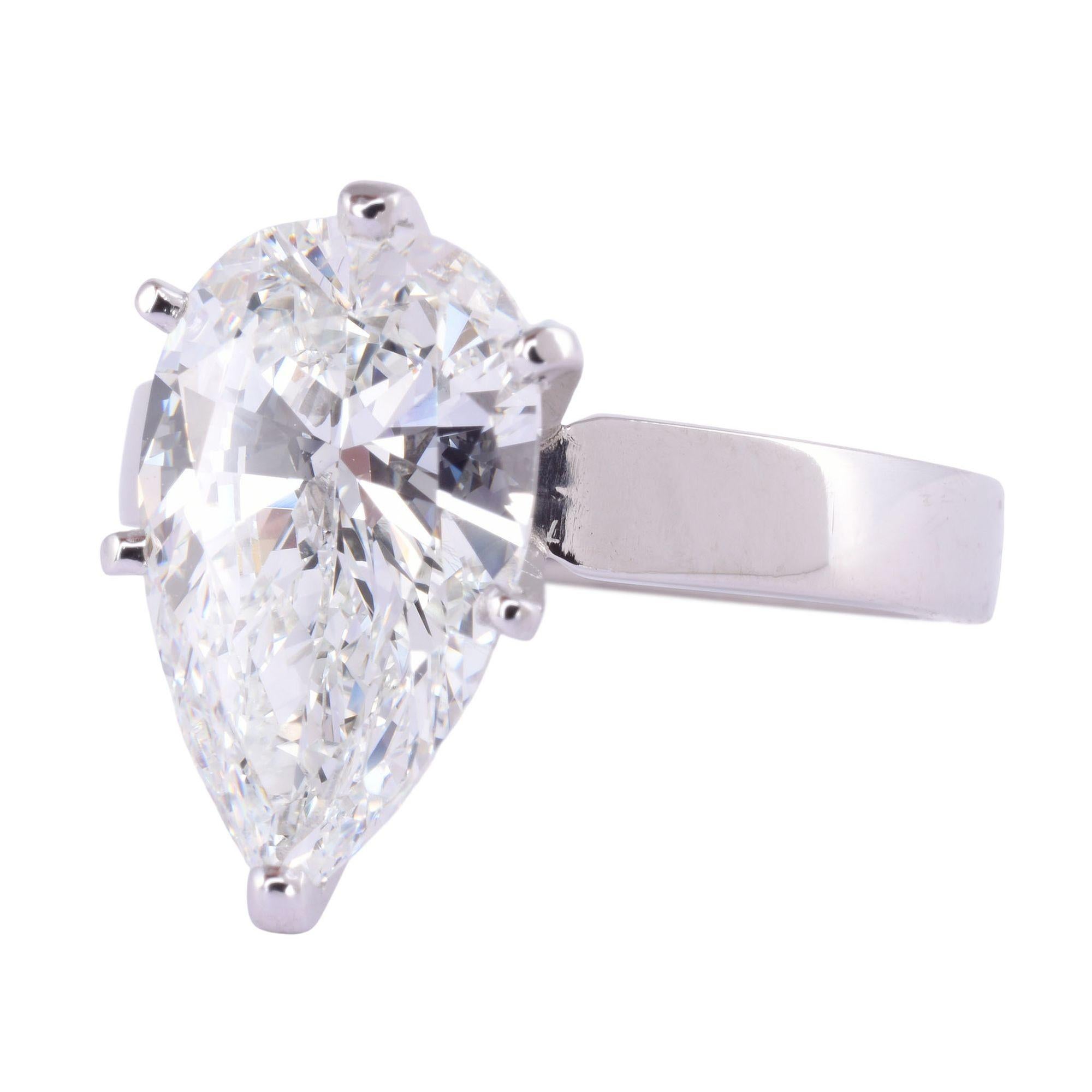 Estate GIA Certified 3.07 Carat VS2 pear diamond solitaire engagement ring. This stunning custom platinum engagement ring features a GIA certified pear brilliant cut natural diamond at 3.07 carats with VS2 clarity and H color. The GIA diamond has