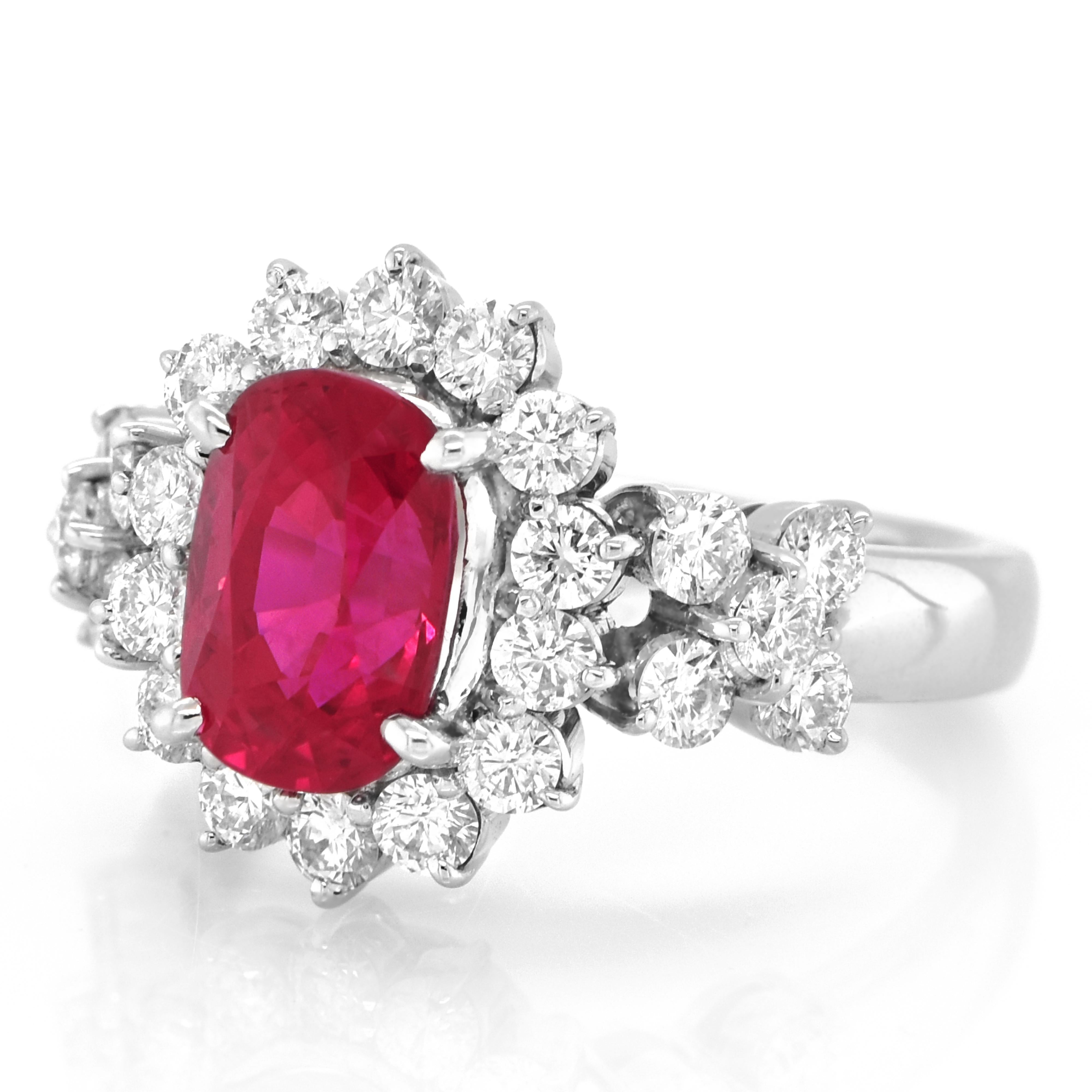 A beautiful ring set in Platinum featuring GIA Certified 3.08 Carat Natural Mozambique Ruby and 1.23 Carat Diamonds. Rubies are referred to as 