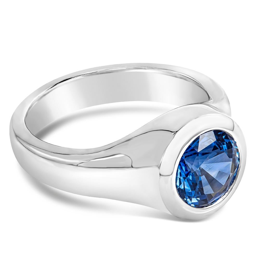 A rare and special men's ring showcasing a single blue sapphire certified by GIA as blue color, set in a chic bezel made in platinum. Sapphire weighs 3.08 carats total. Size 8.5 US (sizable upon request).

Style available in different price ranges.