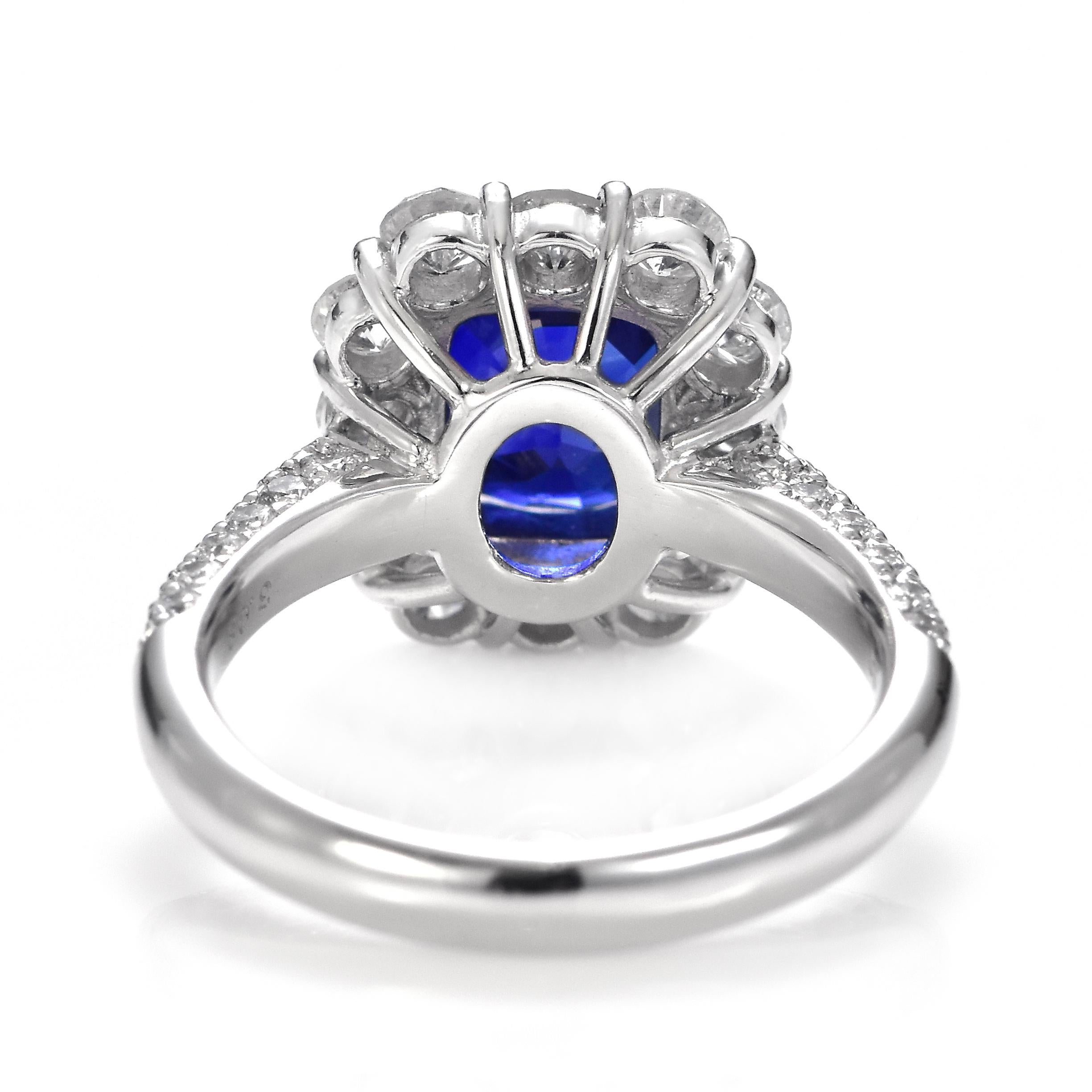 Bague en platine sertie d'un saphir de 3,08 carats et d'un halo de diamants certifié GIA en vente 6