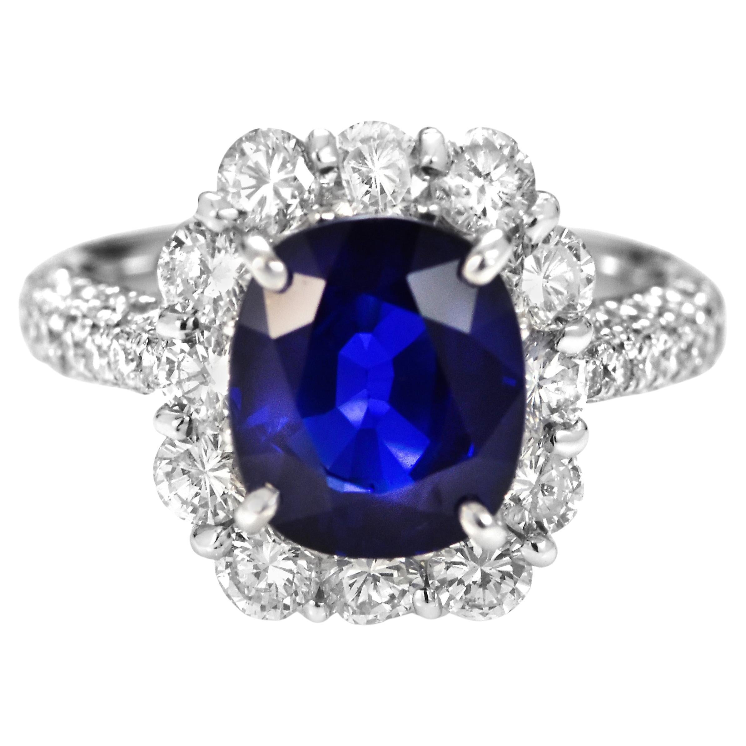 GIA Certified 3.08 Carat Sapphire and Diamond Halo Set Ring Made in Platinum