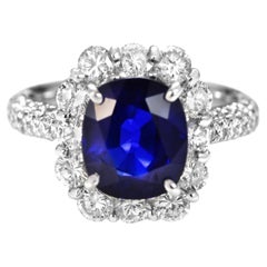 GIA Certified 3.08 Carat Sapphire and Diamond Halo Set Ring Made in Platinum