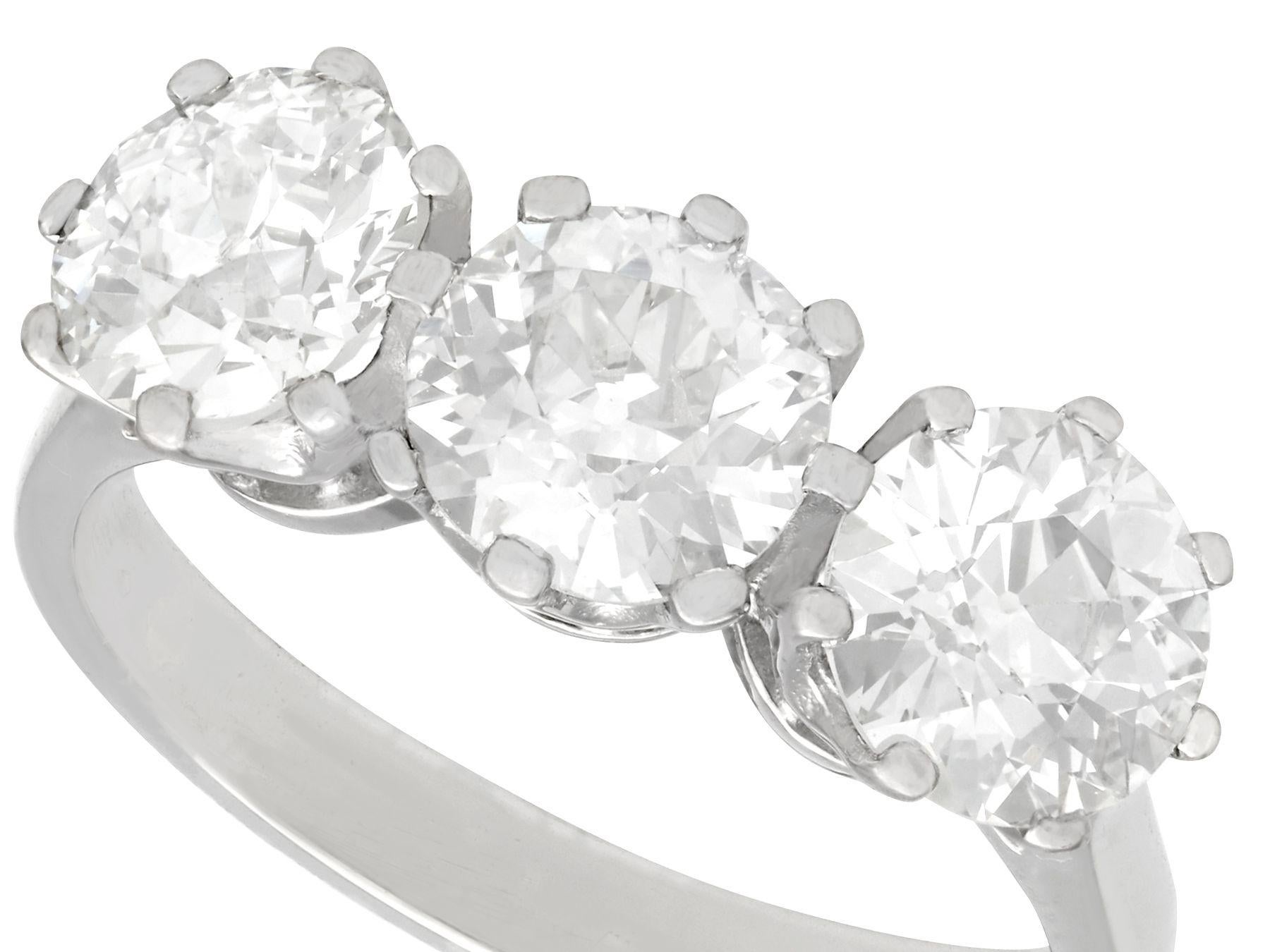 Old European Cut GIA Certified 3.09 Carat Diamond and Platinum Trilogy Ring