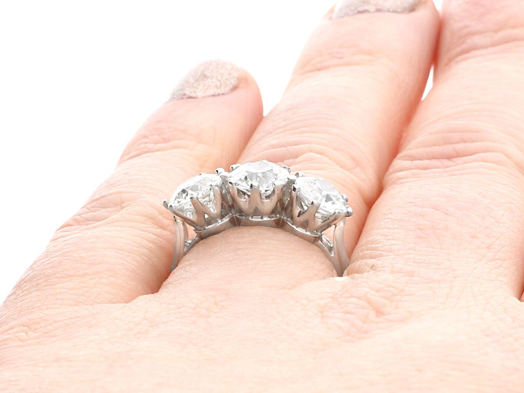 GIA Certified 3.09 Carat Diamond and Platinum Trilogy Ring 4