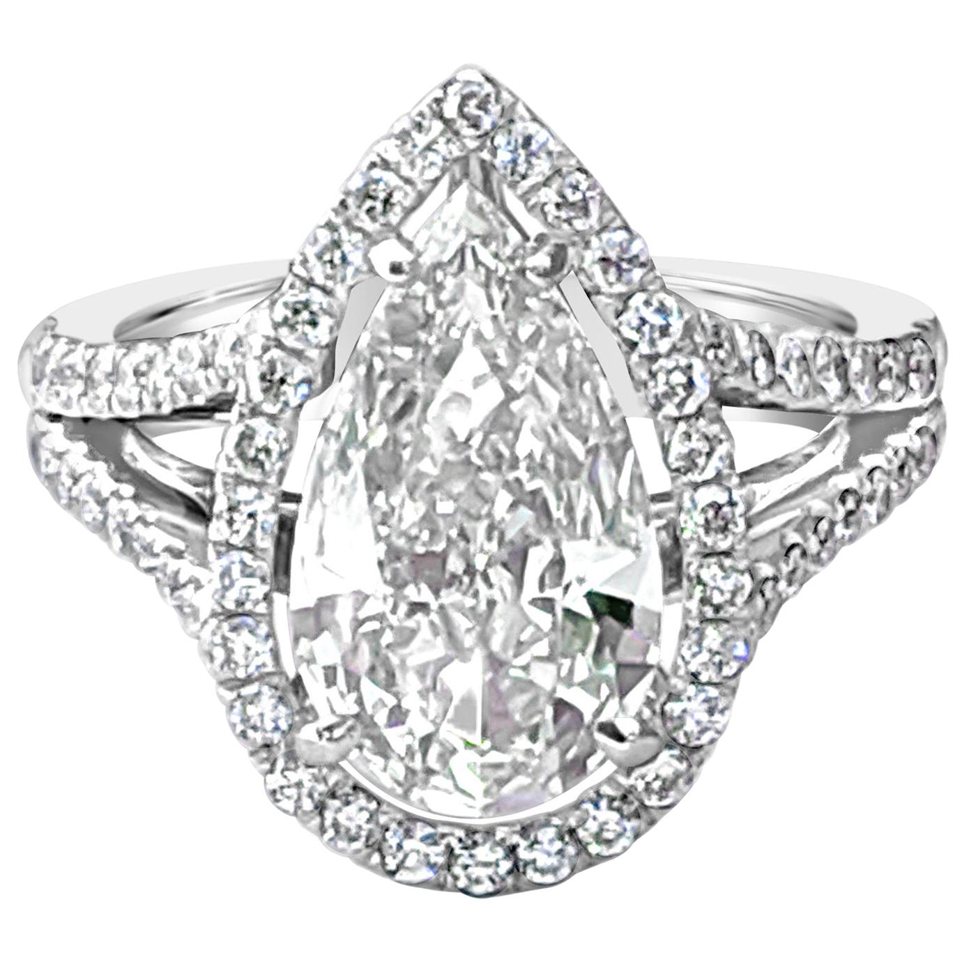 GIA Certified 3.09 Carat Pear Shape Diamond Pavé Ring with Halo and Split Shank For Sale