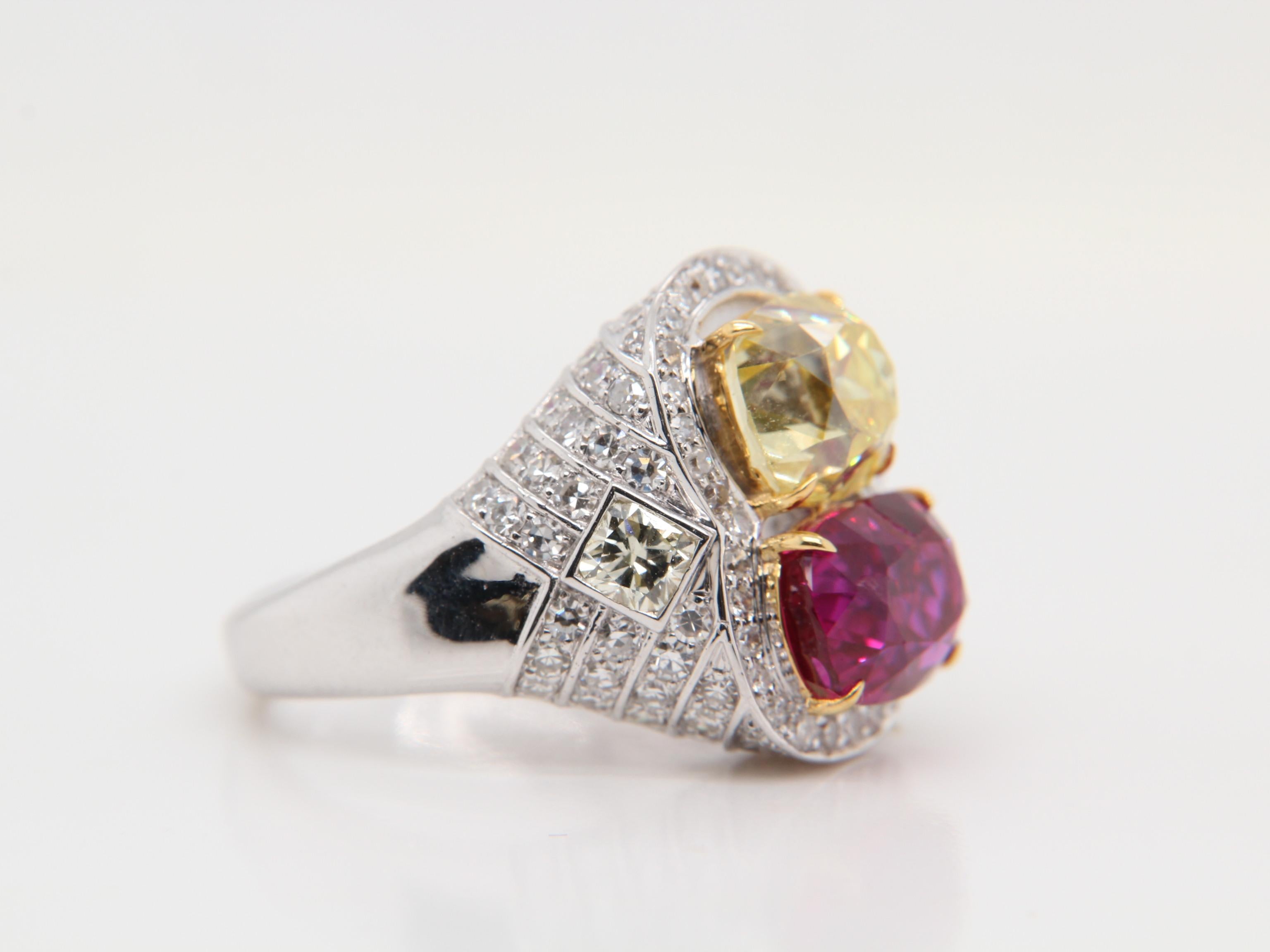 A stunning ruby and colourful diamond ring. The ruby weighs 4.43 carat and is certified by Gem Research Swisslab (GRS) as natural, no heat, and 'Red'. The Diamond weighs 3.09 carat and is certified by Gemological Institute of America (GIA) as