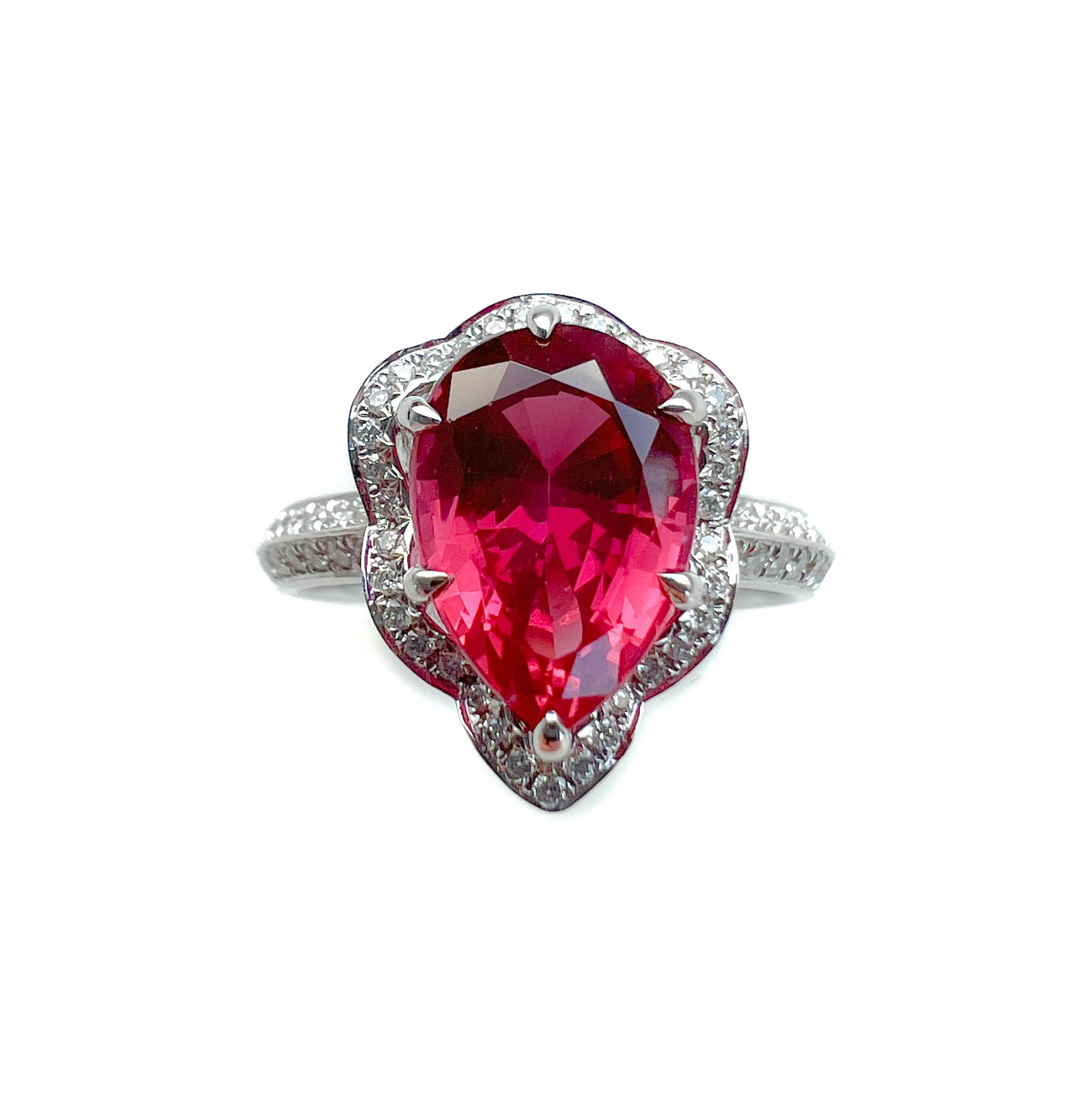 The beautiful loose Spinel was purchased by us in 2022 and made into this ring. We believe the Spinel was previously set in an antique ring but we do not have any info on its history. A reimagined heirloom. Would also make an incredibly unique