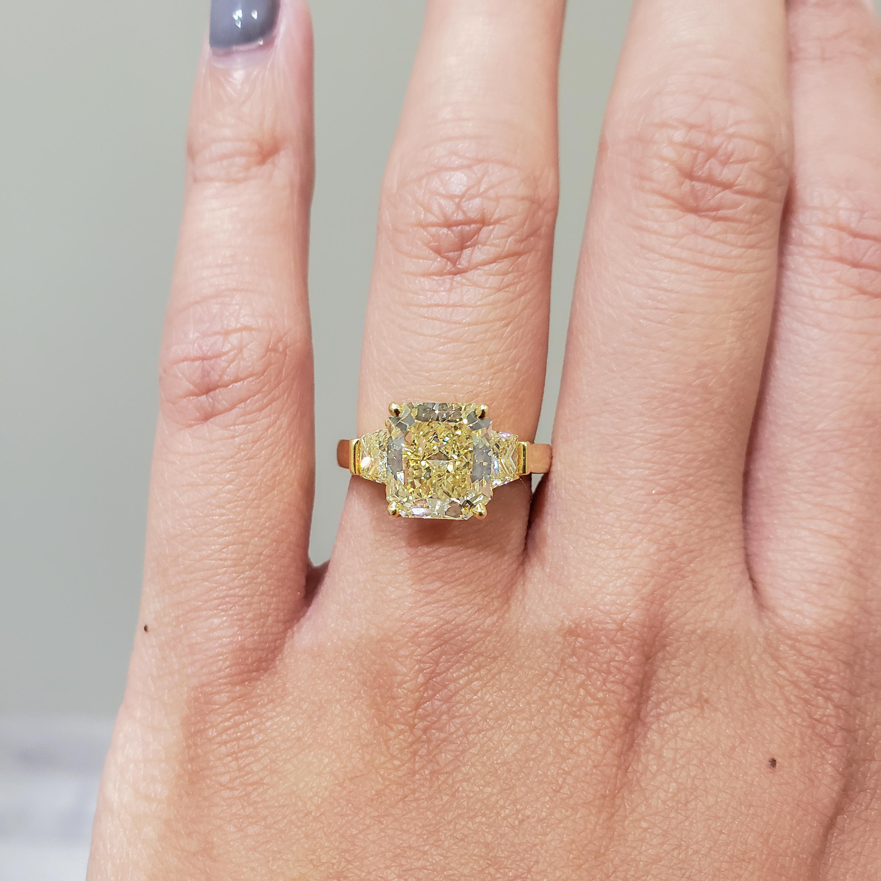 GIA Certified 3.10 Carat Radiant Cut Yellow Diamond Three-Stone Engagement Ring In New Condition In New York, NY