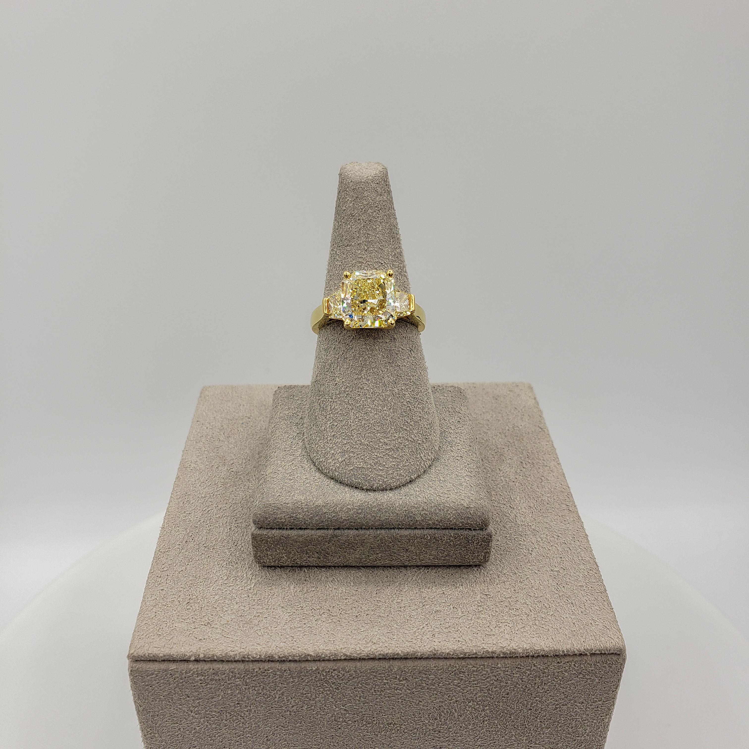 Women's GIA Certified 3.10 Carat Radiant Cut Yellow Diamond Three-Stone Engagement Ring