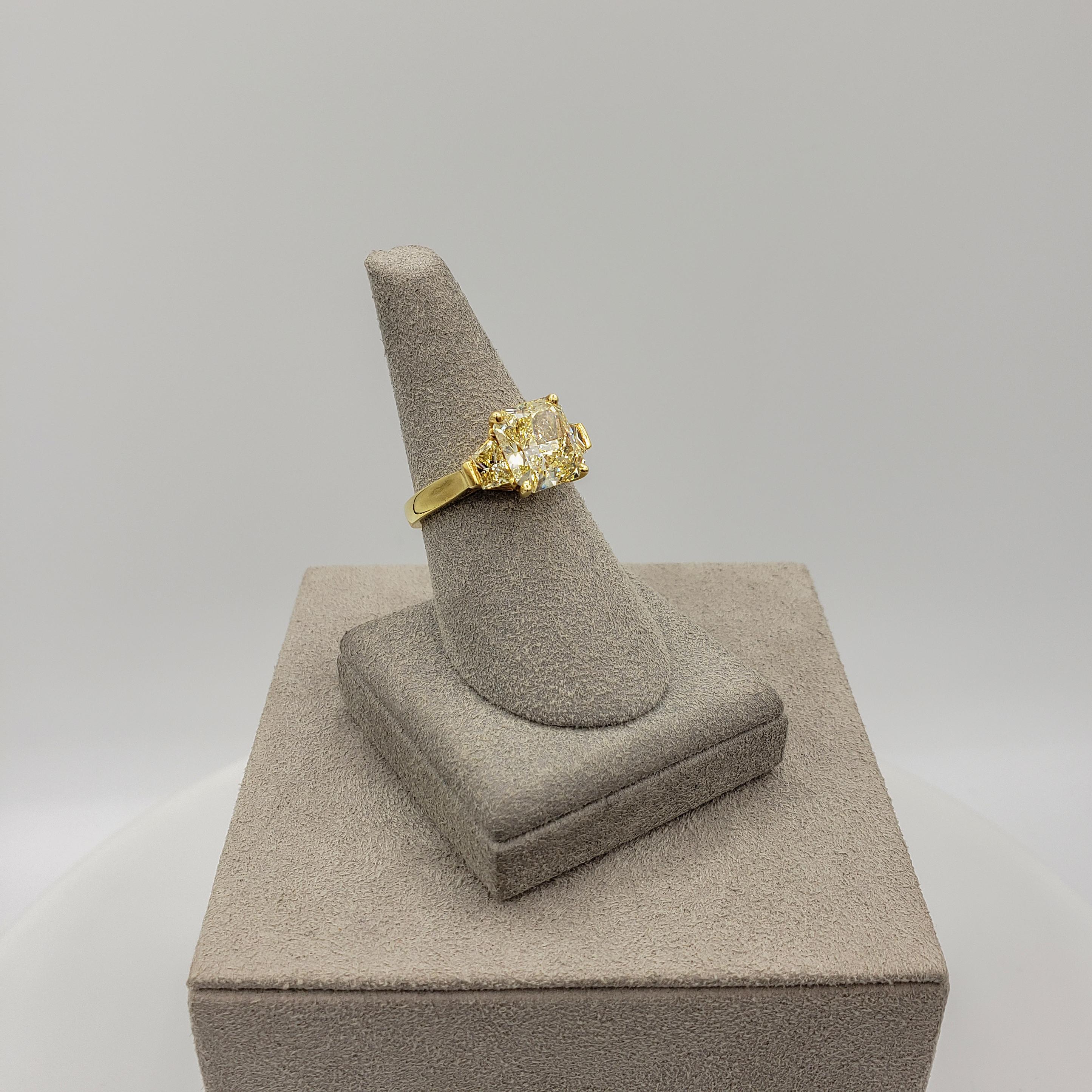 GIA Certified 3.10 Carat Radiant Cut Yellow Diamond Three-Stone Engagement Ring 1