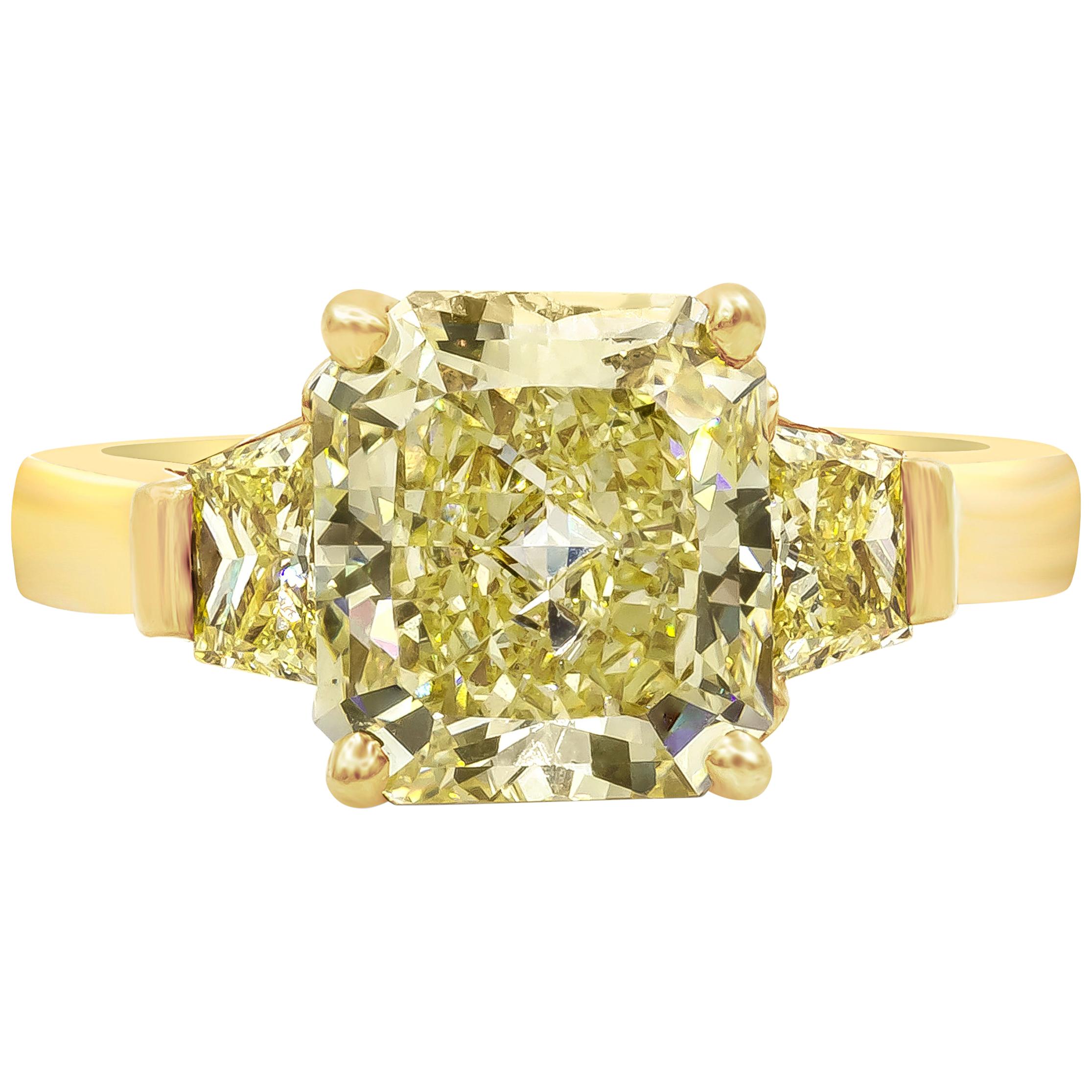 GIA Certified 3.10 Carat Radiant Cut Yellow Diamond Three-Stone Engagement Ring
