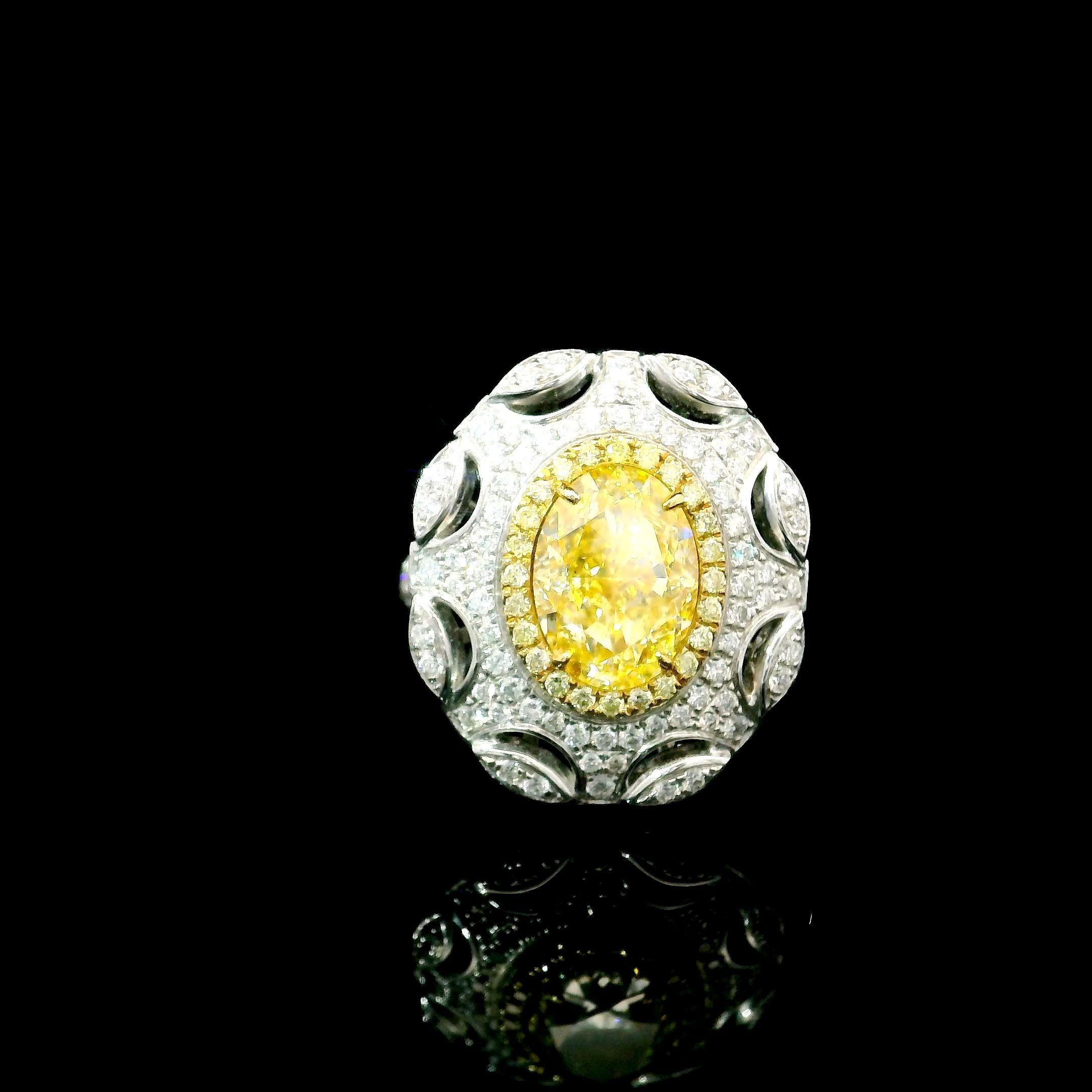 18kt white gold ring with diamonds
  
  Gold colour & karat: White gold 18kt
  Weight: 8.93 grams
  
  Set with-
  Stone type: Diamonds
  Shape: Oval
  Carat: 3.10 ct
  Colour: W - X Colour
  Clarity: SI1
  
  Surrounding Stones: Diamonds
 1) White