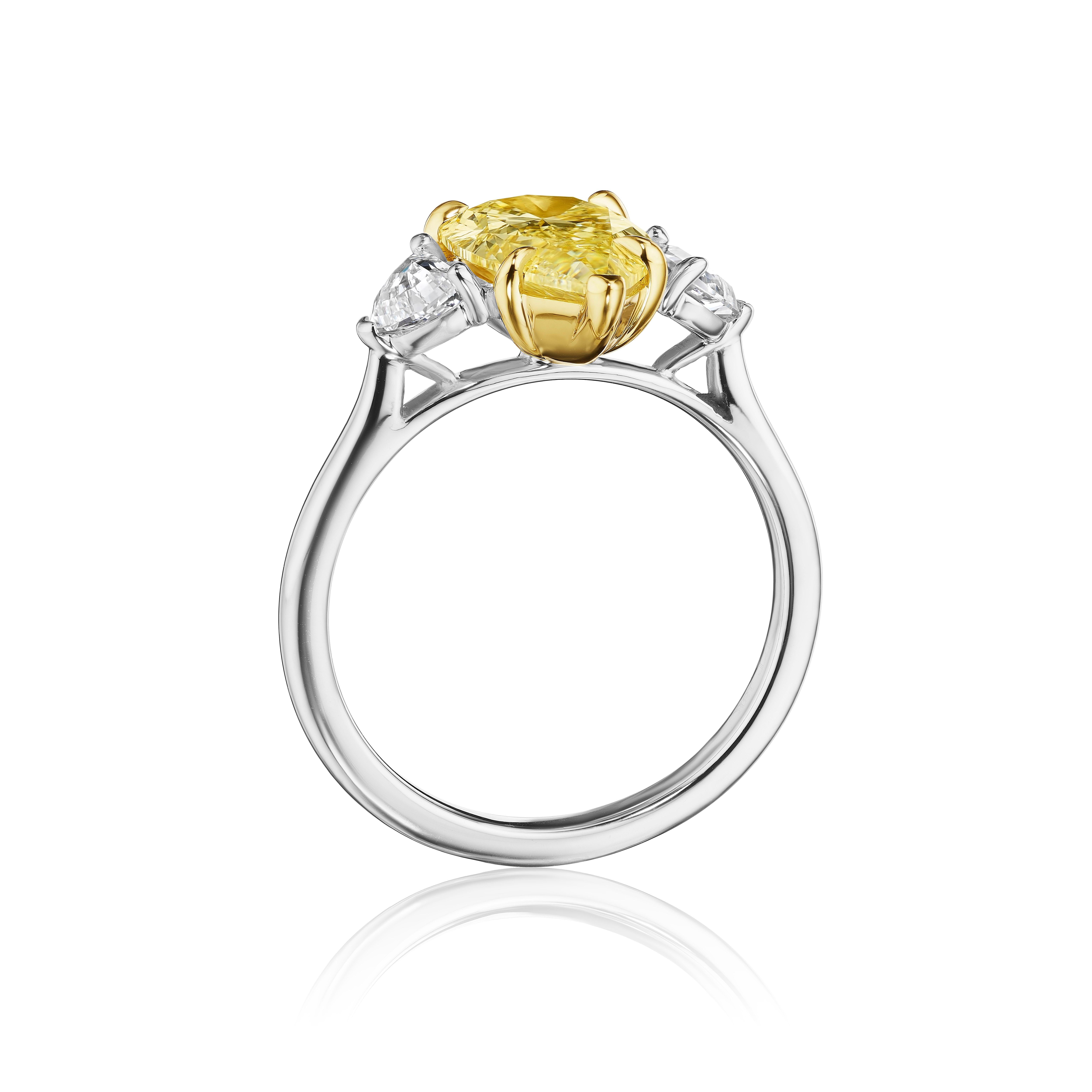 •	Platinum & 18KT Two Tone
•	3.11 Carats
•	Size: 6.5

•	Number of Pear Shape Diamonds: 1
•	Carat Weight: 2.51ctw
•	Color: Fancy Light Yellow
•	Clarity: SI2
•	Stone Measurements: 13.28 x 7.40mm
•	GIA: 2225795915

•	Number of Cadillac Cut Diamonds: