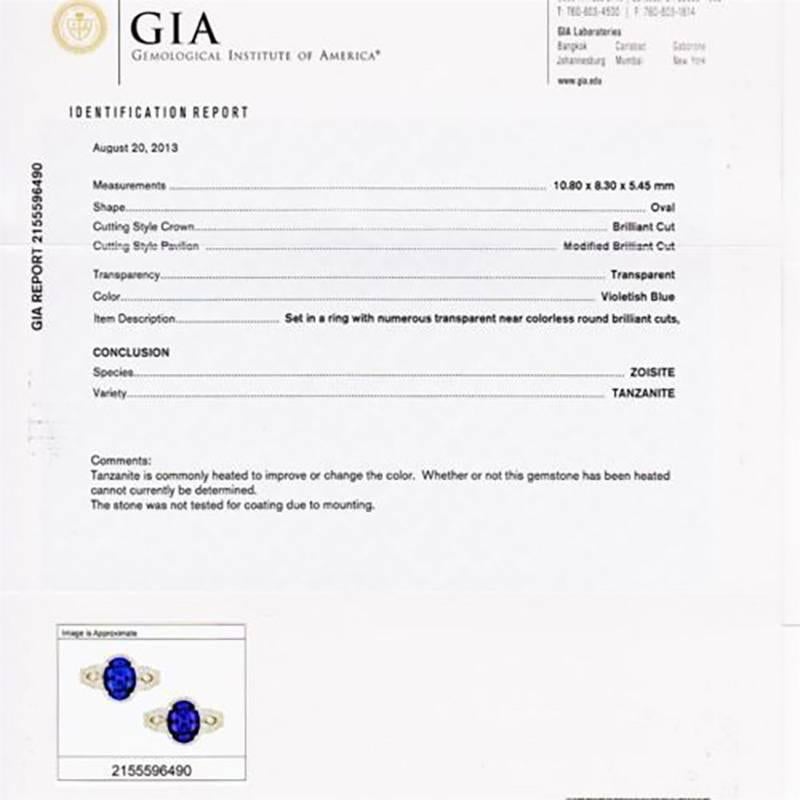 Women's GIA Certified 3.14 Carat Oval Tanzanite Diamond Halo White Gold Cocktail Ring For Sale