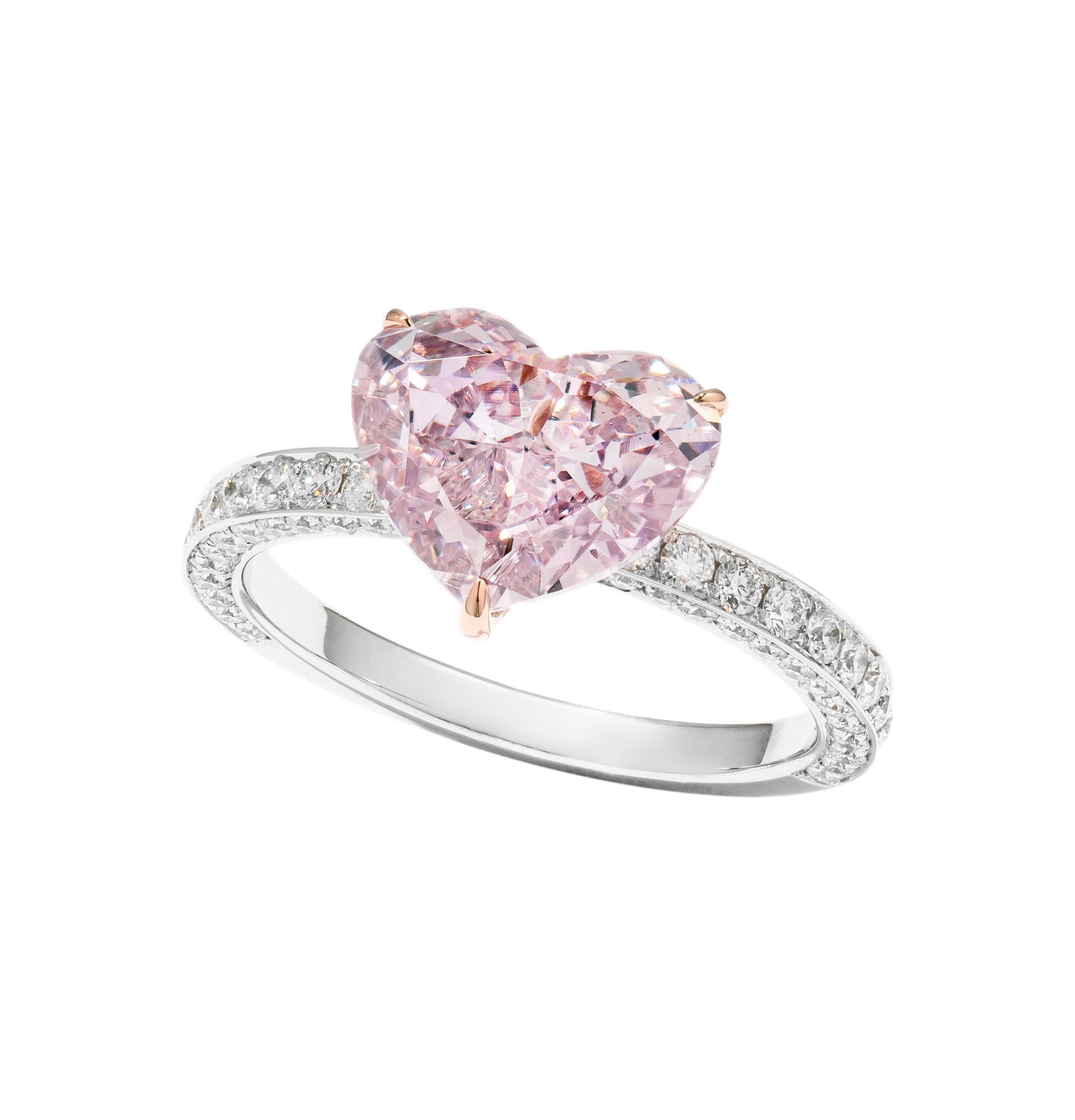 This piece is available for custom order only. 

Sweet, romance featuring a 2.53 carat Fancy Pink Purple Diamond (GIA Certificate #5141346599) heart shape ring. Vihari Jewels created this collector's item for the feminine women in mind. The ring is