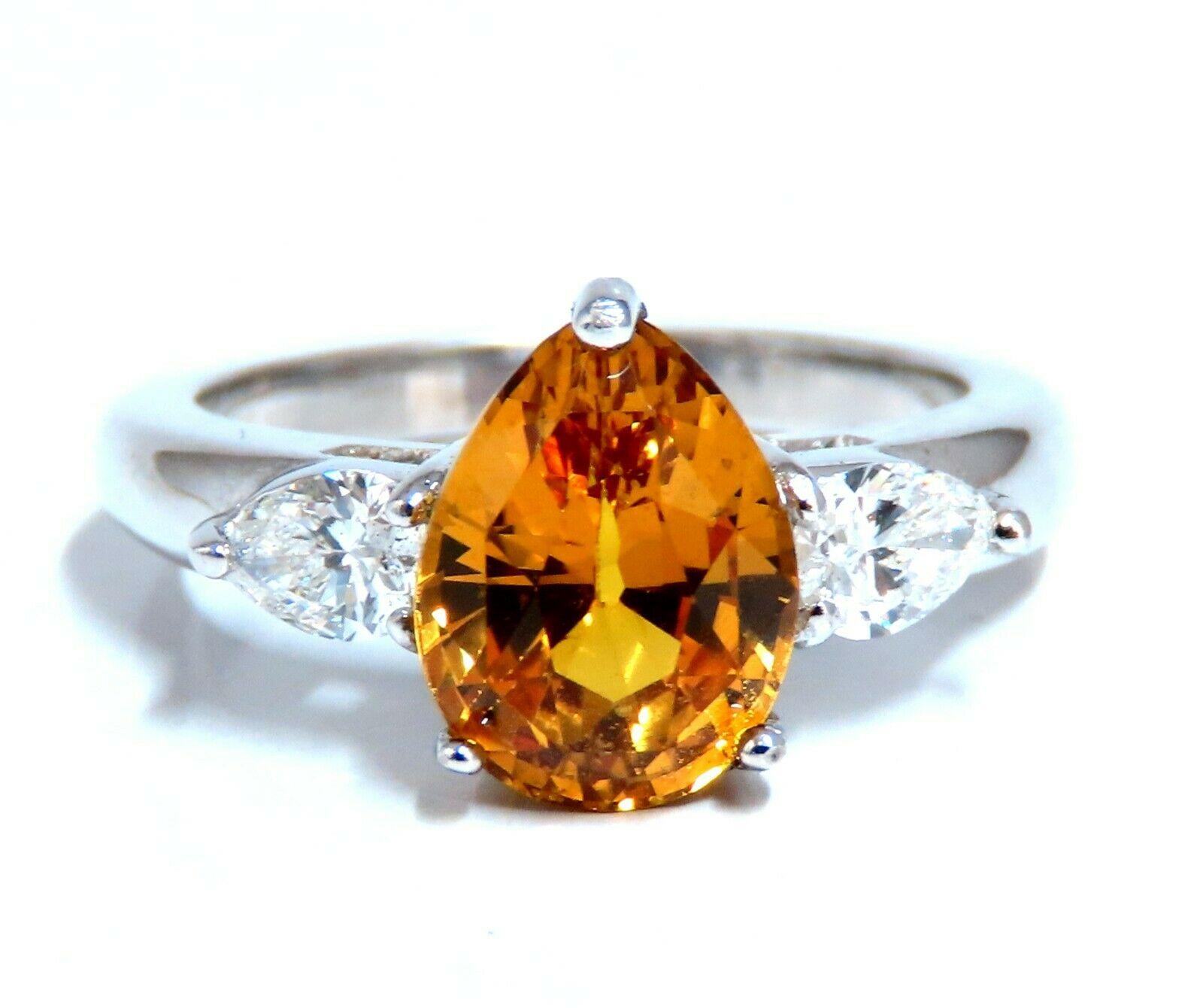Classic Three Anniversary 

3.15ct. Natural GIA Certified Yellow Orange Sapphire Ring

GIA Certified Report ID: 5201858091

10.06 X 7.57 X 5.25mm

Full cut Pear brilliant 

Clean Clarity & Transparent

.52ct. (2) Pear Diamonds 

H-color Vs-2