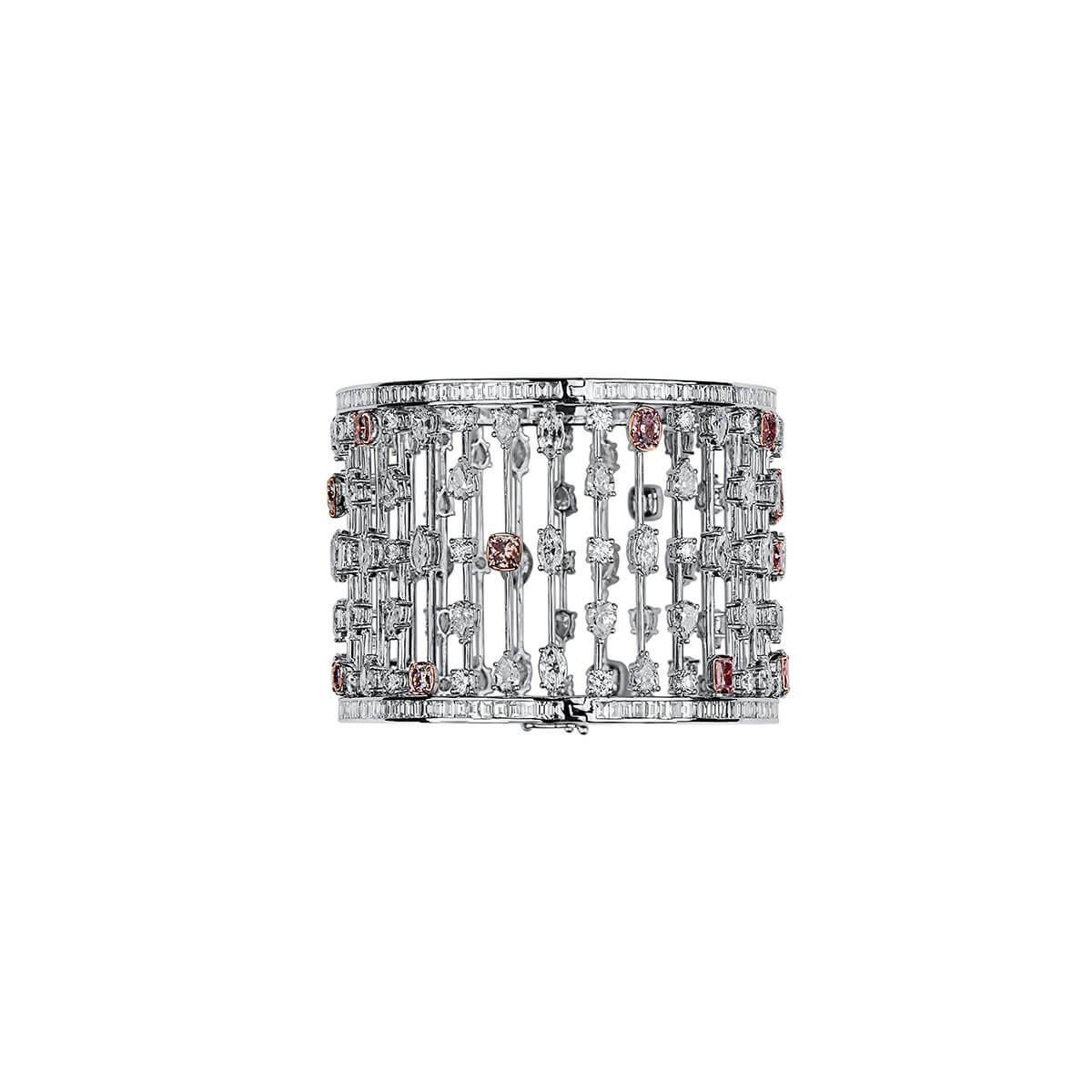 This incrediblie piece consits of the perfect mixture of natural white and pink diamonds. Together making up a total of 31.60 Carats. Sophisticated yet bold, this is GIA certified and has been expertly crafted using 18 Karat white gold. 

The color