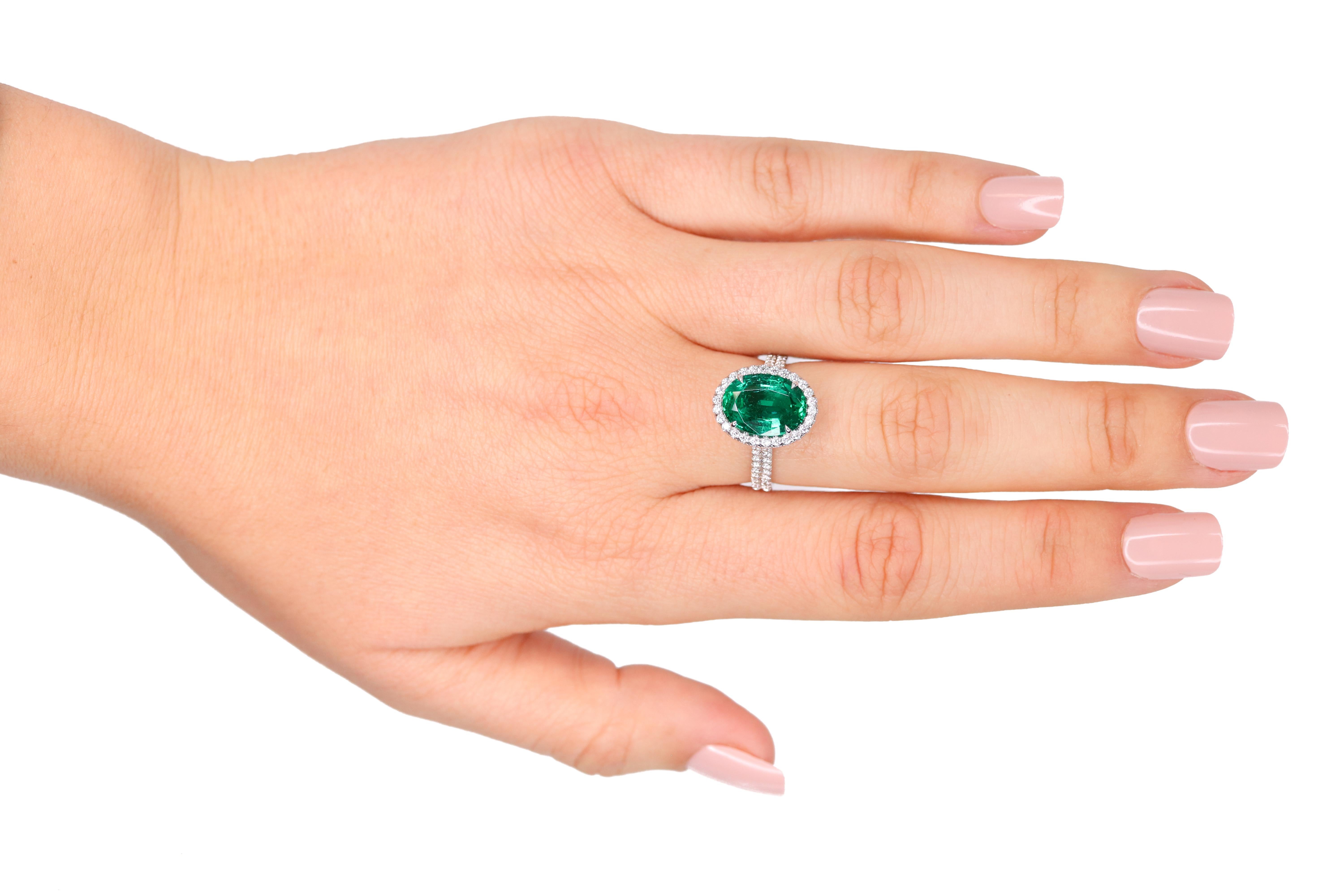 Modern GIA Certified 3.17ct Oval Cut Green Emerald and Diamond Ring For Sale