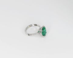 GIA Certified 3.17 Carat Oval Emerald and Diamond Halo Ring