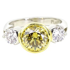 GIA Certified 3.18 Carats Fancy Brownish Yellow Three Stone Ring