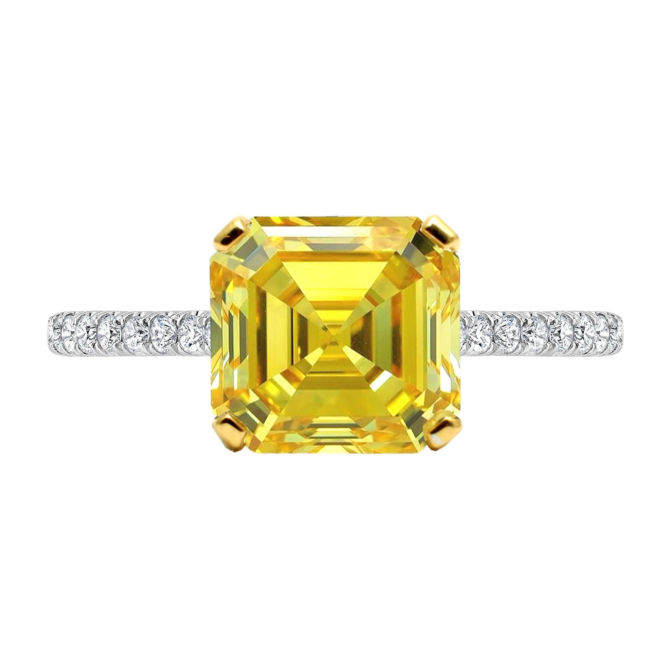 Embrace unparalleled elegance with this GIA Certified 3.18 Ct Asscher Fancy Vivid Yellow Diamond Ring adorned with pavé diamonds. At its center shines a mesmerizing Asscher-cut diamond of extraordinary quality, certified by the esteemed Gemological