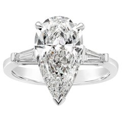 GIA Certified 3.19 Carats Pear Shape Diamond Three Stone Engagement Ring