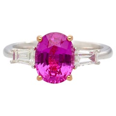 Anillo de zafiro rosa ovalado y diamante de 3 piedras certificado por GIA de 3,2 quilates sin calor