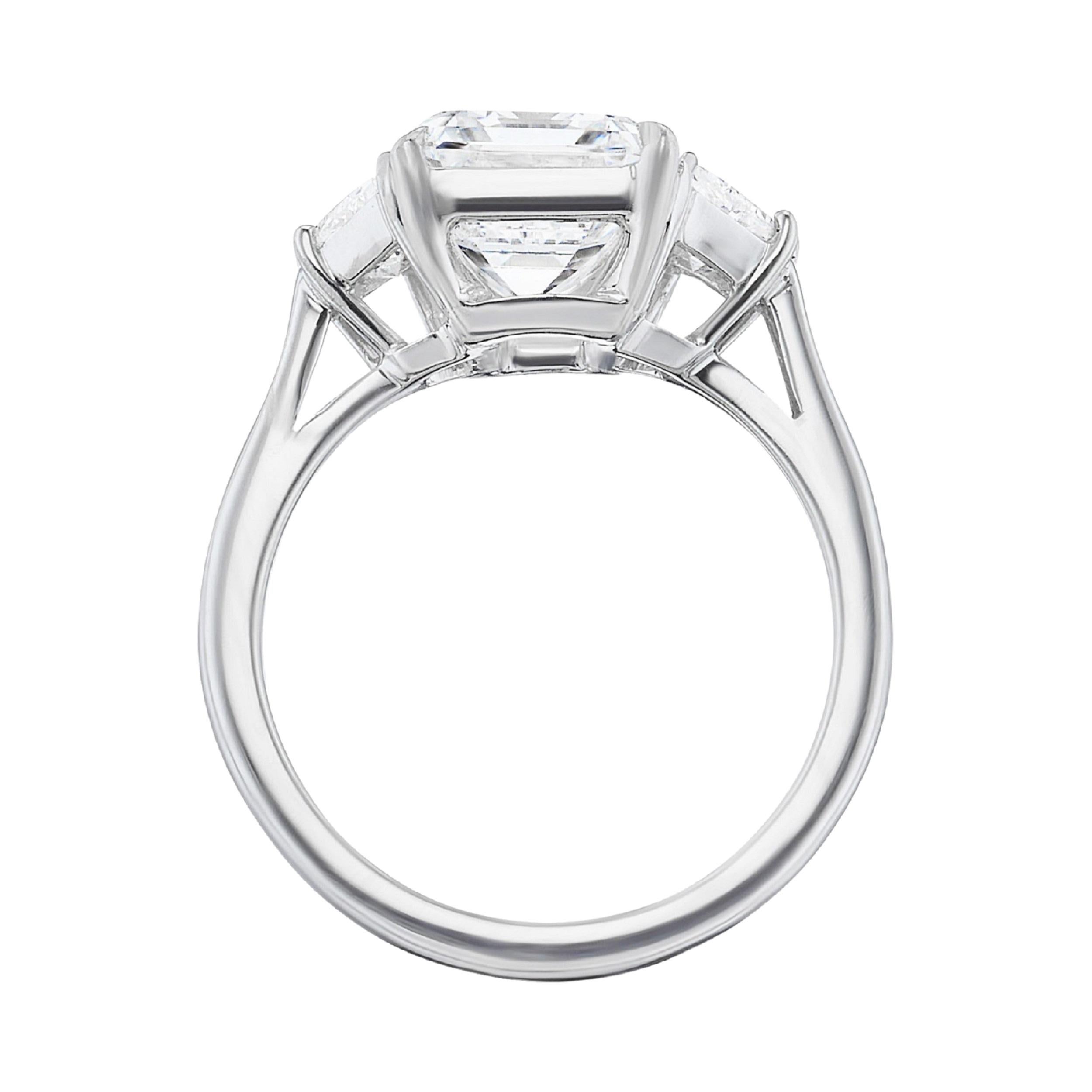 Contemporary GIA Certified 3.01 Carat Three-Stone Emerald Cut Diamond Ring For Sale