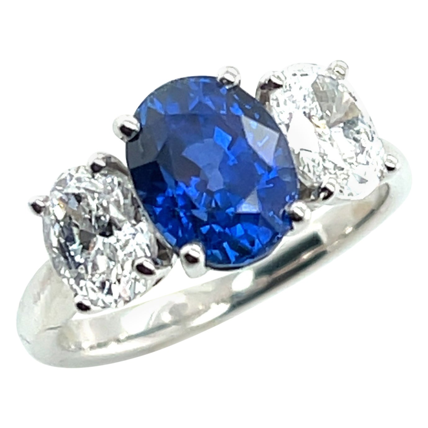 GIA Certified 3.20 Ct. Unheated Blue Sapphire and Diamond Platinum 3-Stone Ring For Sale