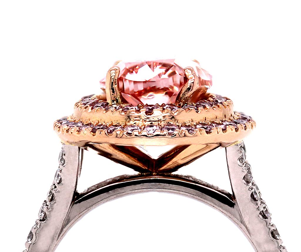 GIA Certified 3.21 Ct Fancy Vivid Orangey Pink Oval Diamond Ring in Platinum In New Condition In London, GB