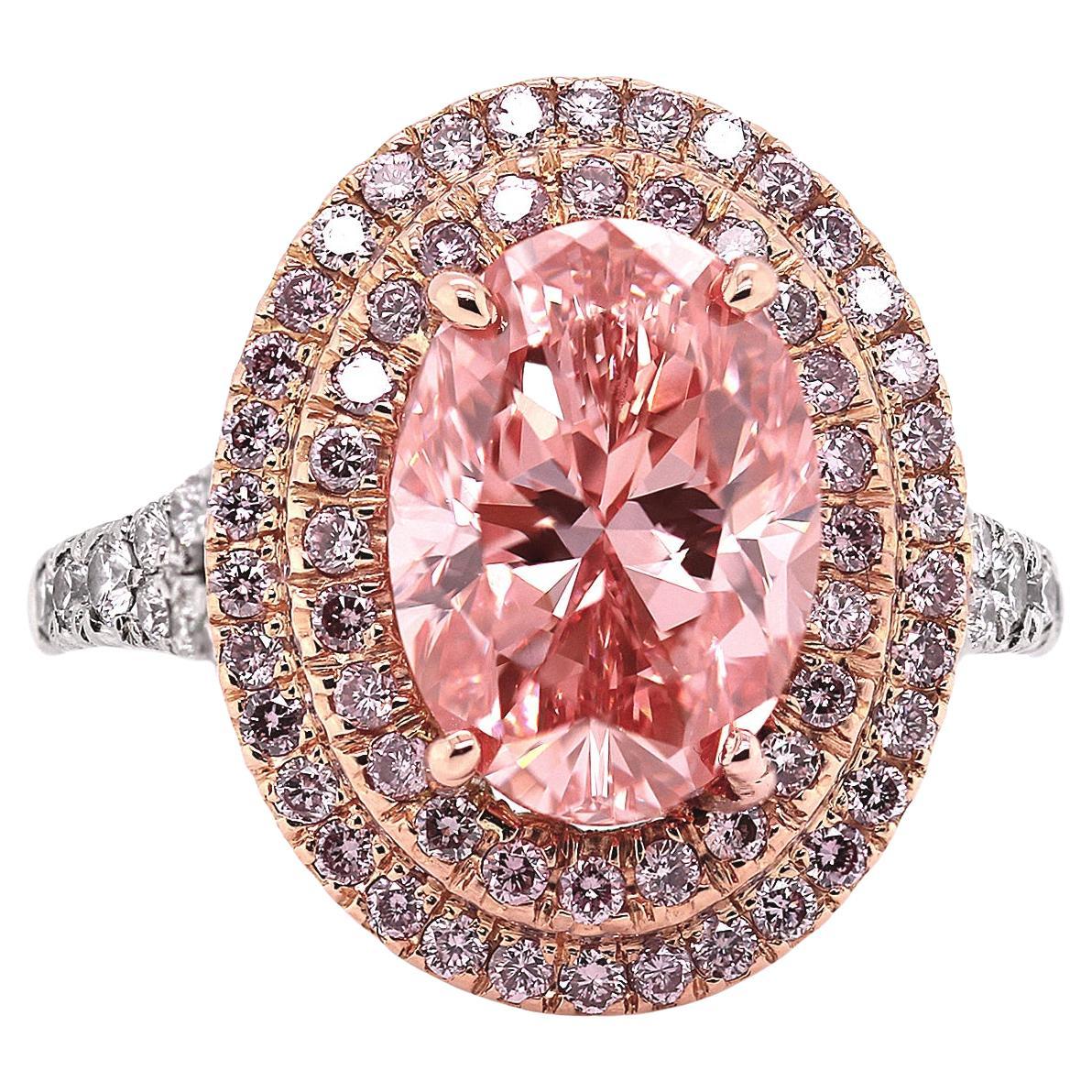 GIA Certified 3.21 Ct Fancy Vivid Orangey Pink Oval Diamond Ring in Platinum