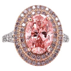 GIA Certified 3.21 Ct Fancy Vivid Orangy Pink Oval Diamond Ring in Platinum