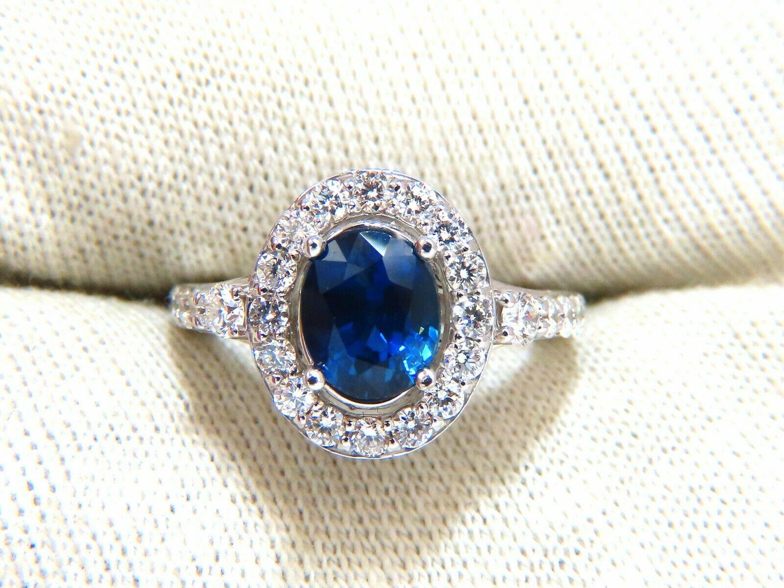 Halo & Accent Prime

GIA Certified 

2.10ct. Natural No Heat Blue Sapphire ring.

Report:  6312203504

Oval cut: 8.12 X 6.66 X 4.68mm

Transparent, Blue



1.11ct. Side natural Round diamonds

F color, Vs-2 clarity.

14kt. white gold

5.3