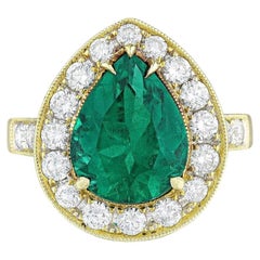 GIA Certified 3.25 Carat Colombian Emerald and Diamond Engagement Ring