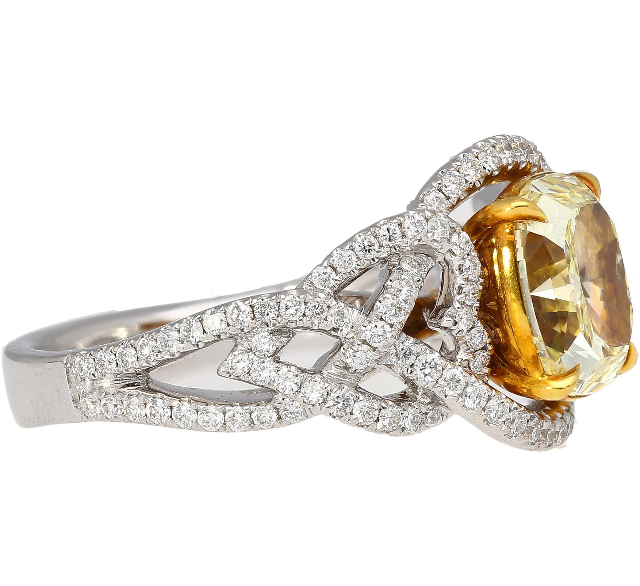 Radiant Cut GIA Certified 3.25 Carat Yellow Diamond Interlocking Heart Shank Engagement Ring For Sale