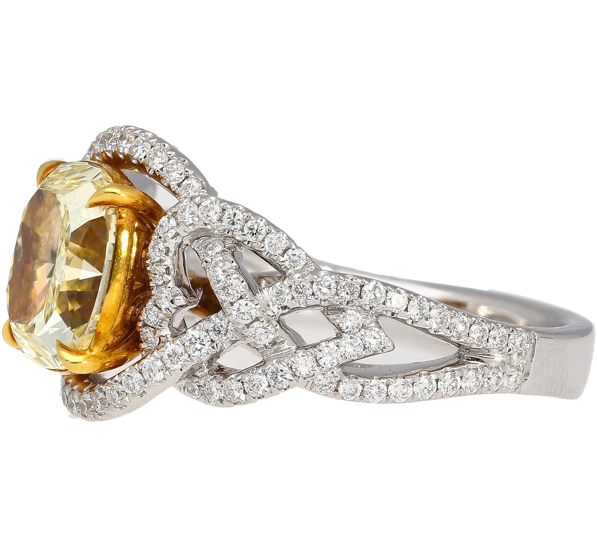 GIA Certified 3.25 Carat Yellow Diamond Interlocking Heart Shank Engagement Ring In New Condition For Sale In Miami, FL