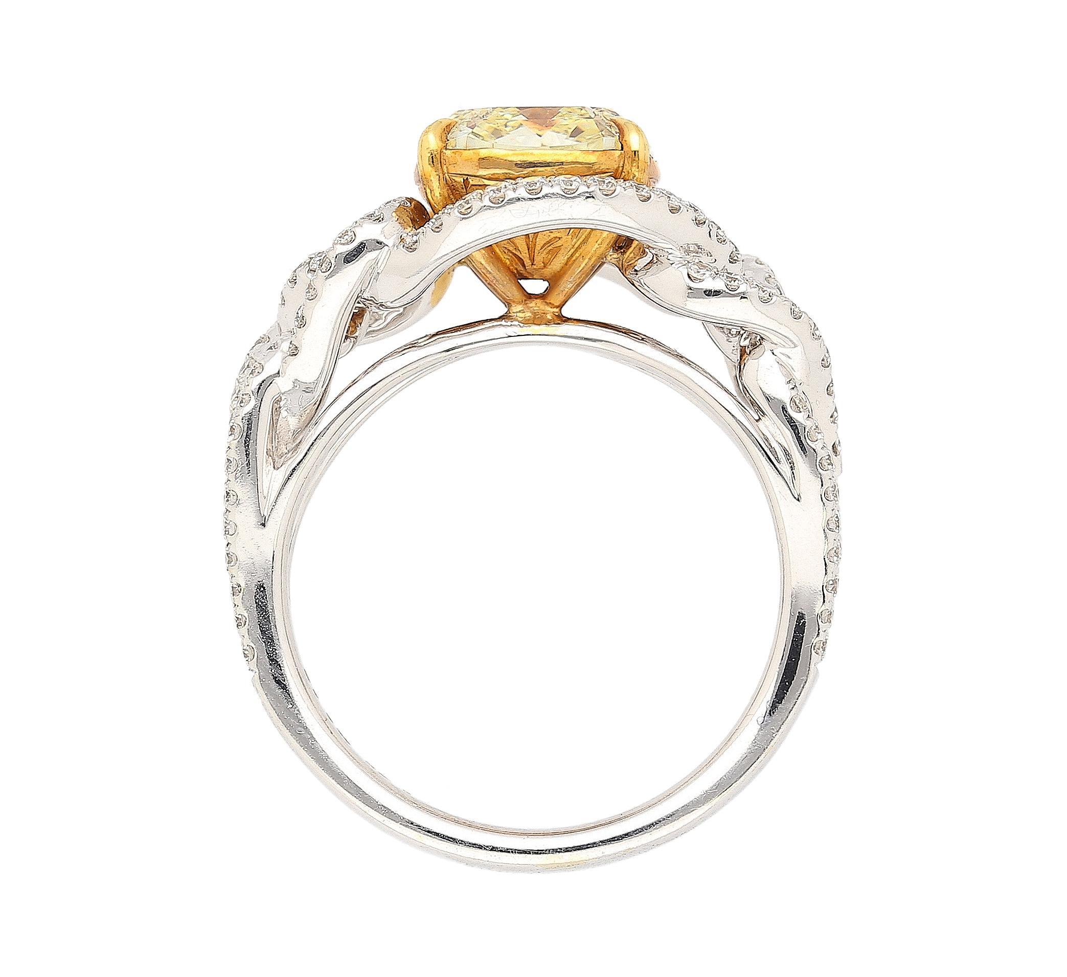 Women's GIA Certified 3.25 Carat Yellow Diamond Interlocking Heart Shank Engagement Ring For Sale