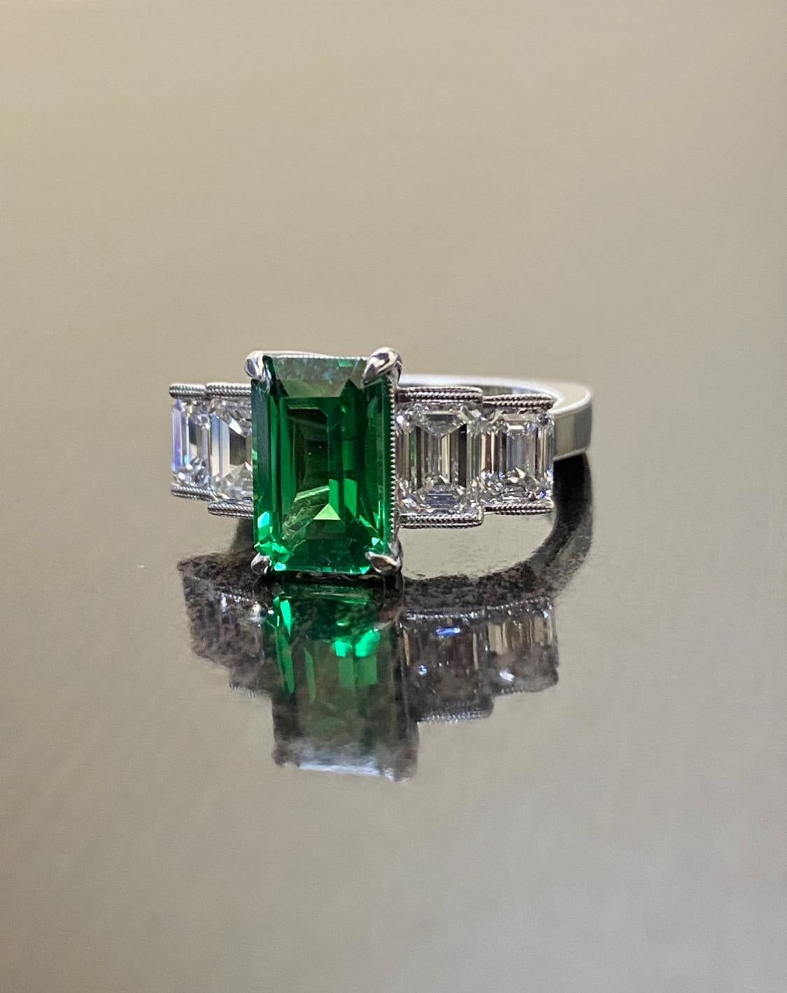 DeKara Designs Collection

Featuring An All GIA Certified Five Stone Emerald Cut Diamond and Radiant Cut Garnet Engagement Ring.
Shape- Elongated Radiant Cut 9 (Octagonal Step Cut)

Metal- 90% Platinum, 10% Iridium.

Stones- GIA Certified Radiant