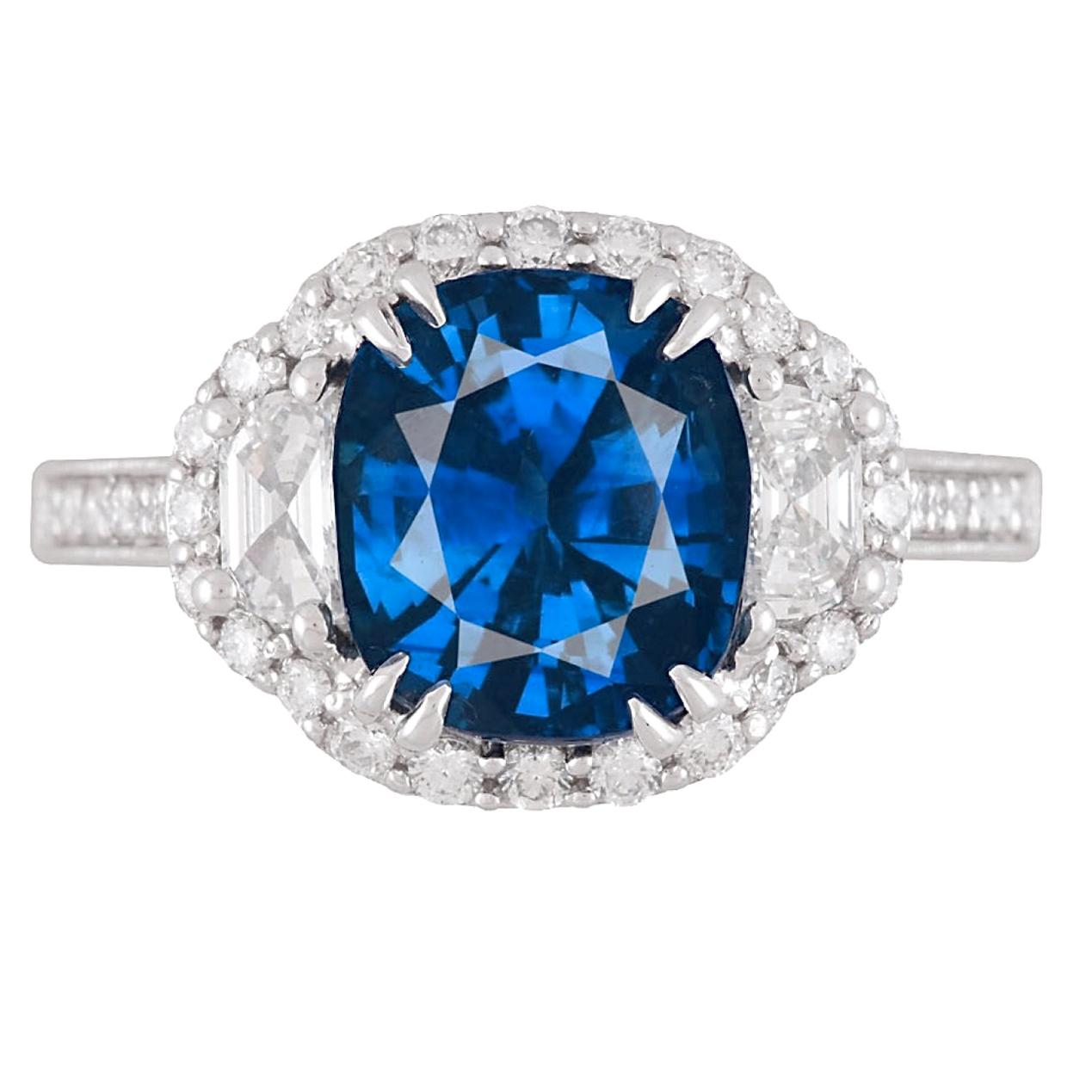 Contemporary GIA Certified 3.28 Ct Vivid Blue Cushion Cut Ceylon Sapphire Ring in 18k ref544 For Sale