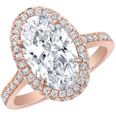 GIA Certified 3.29 Carat D VS2 Oval Diamond 18 Karat Rose Gold Halo Ring