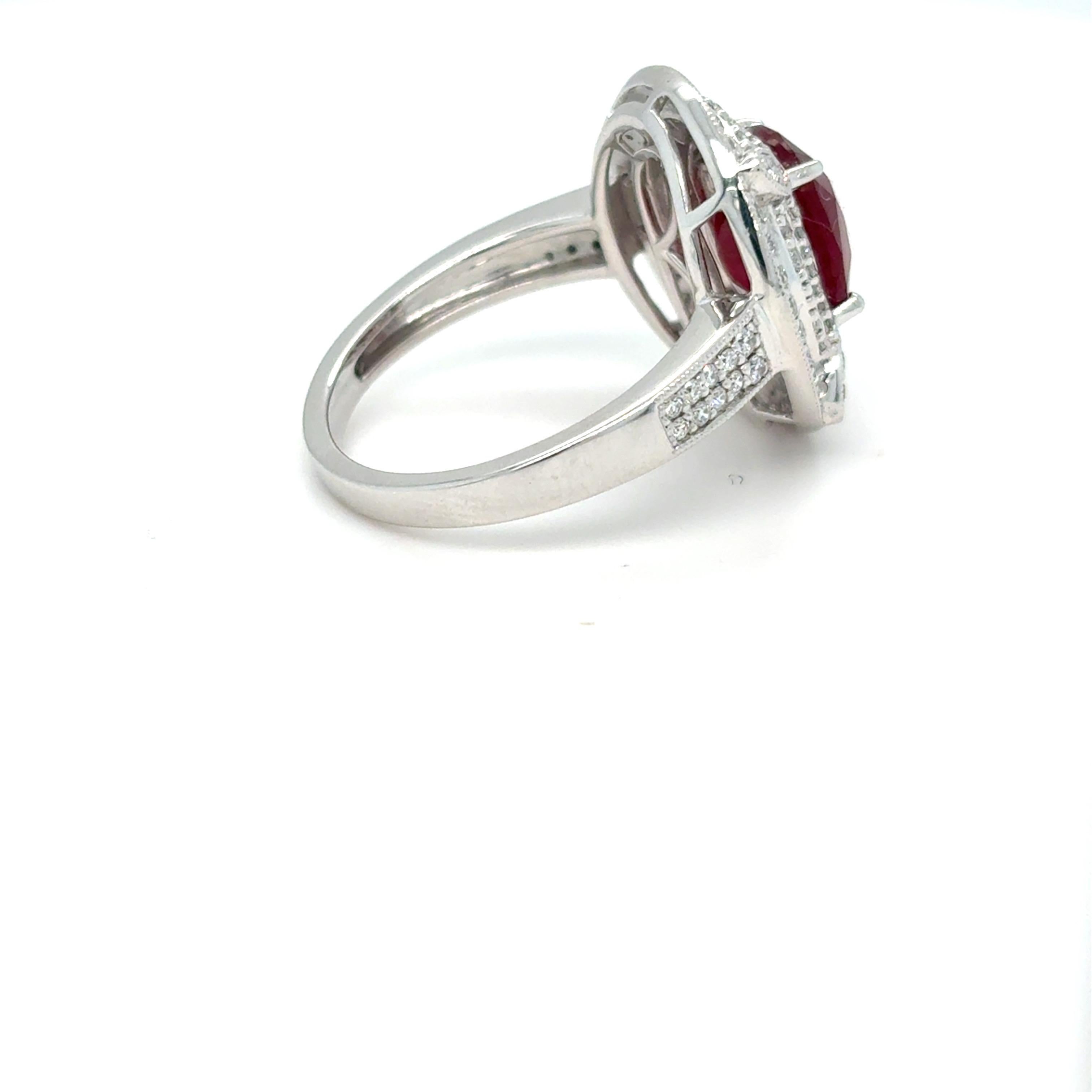 GIA Certified 3.29 Carat Oval Cut Ruby Diamond Platinum Halo Ring For Sale 11