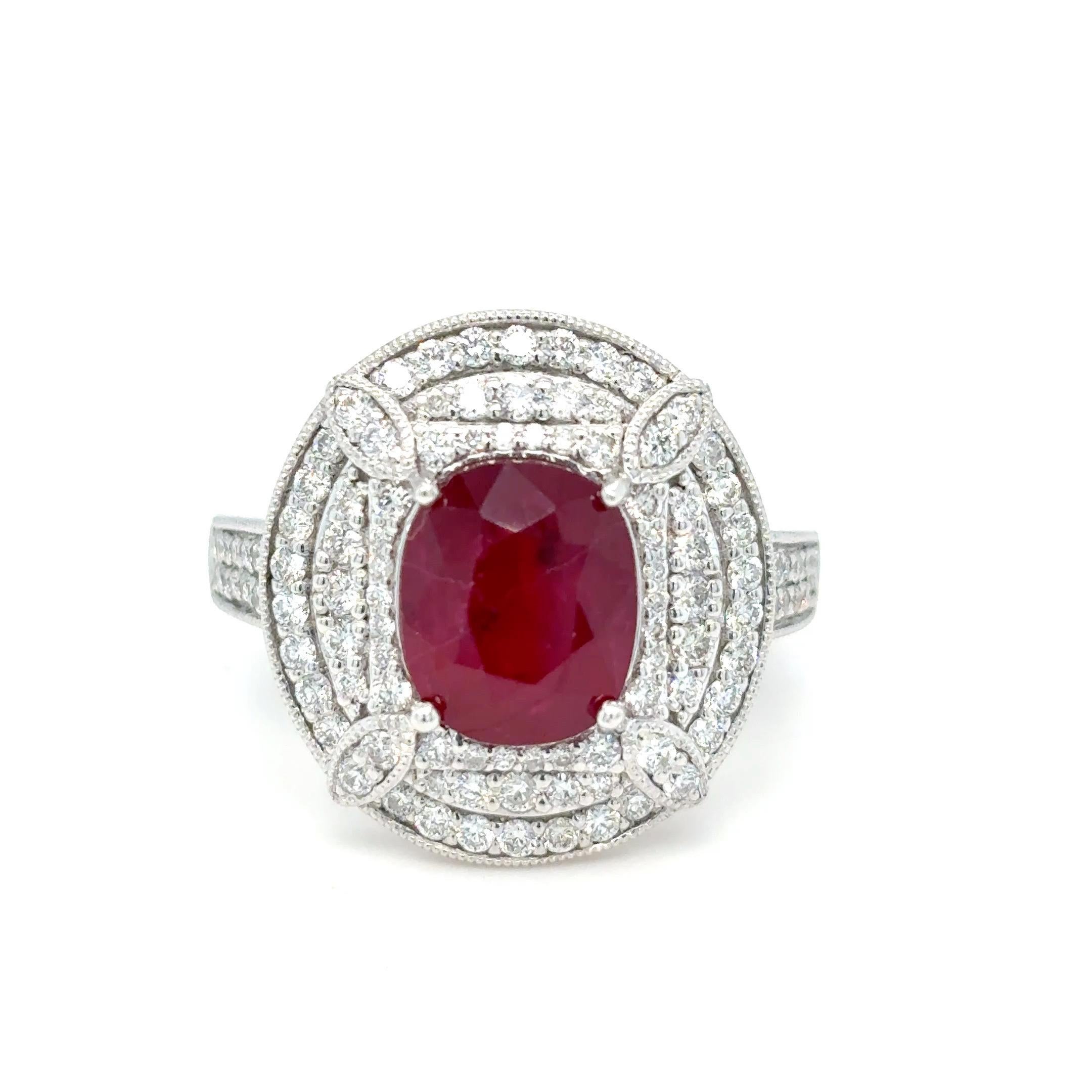 GIA-Certified 3.29 Carat Ruby & Diamond Ring
This stunning ring features a 3.29 carat oval-cut ruby, certified by GIA, elegantly framed by a halo of sparkling diamonds totaling 0.72 carats. Crafted in luxurious platinum, it showcases a beautifully