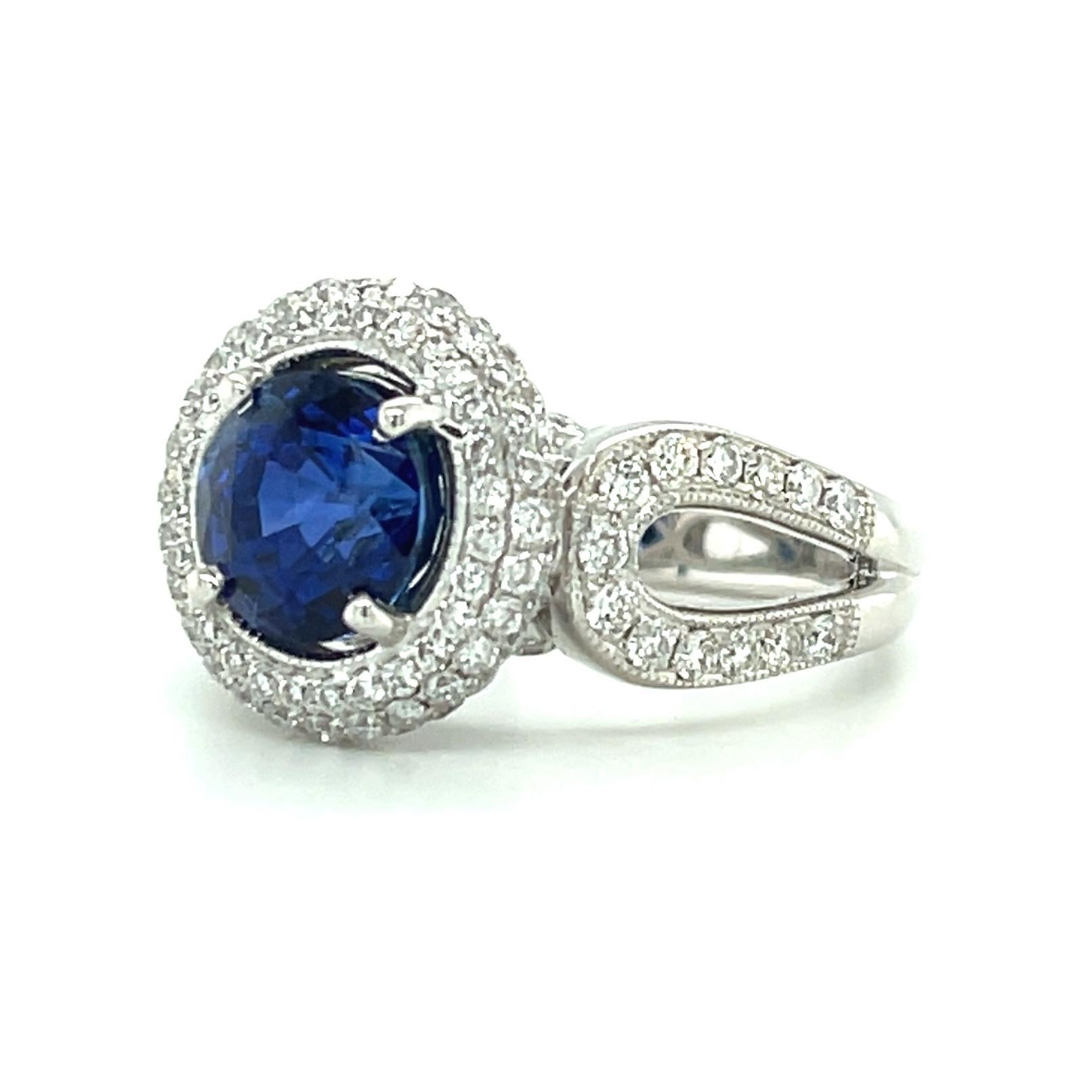 Round Cut GIA Certified 3.29 Carat Round Blue Sapphire and Diamond Halo Ring in White Gold For Sale