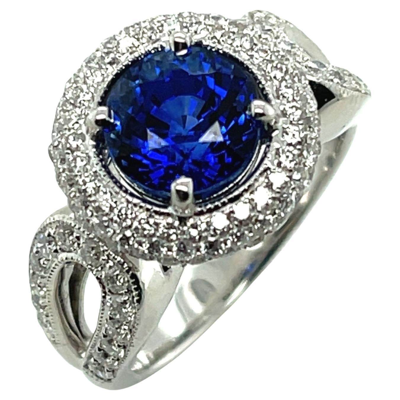GIA Certified 3.29 Carat Round Blue Sapphire and Diamond Halo Ring in White Gold For Sale