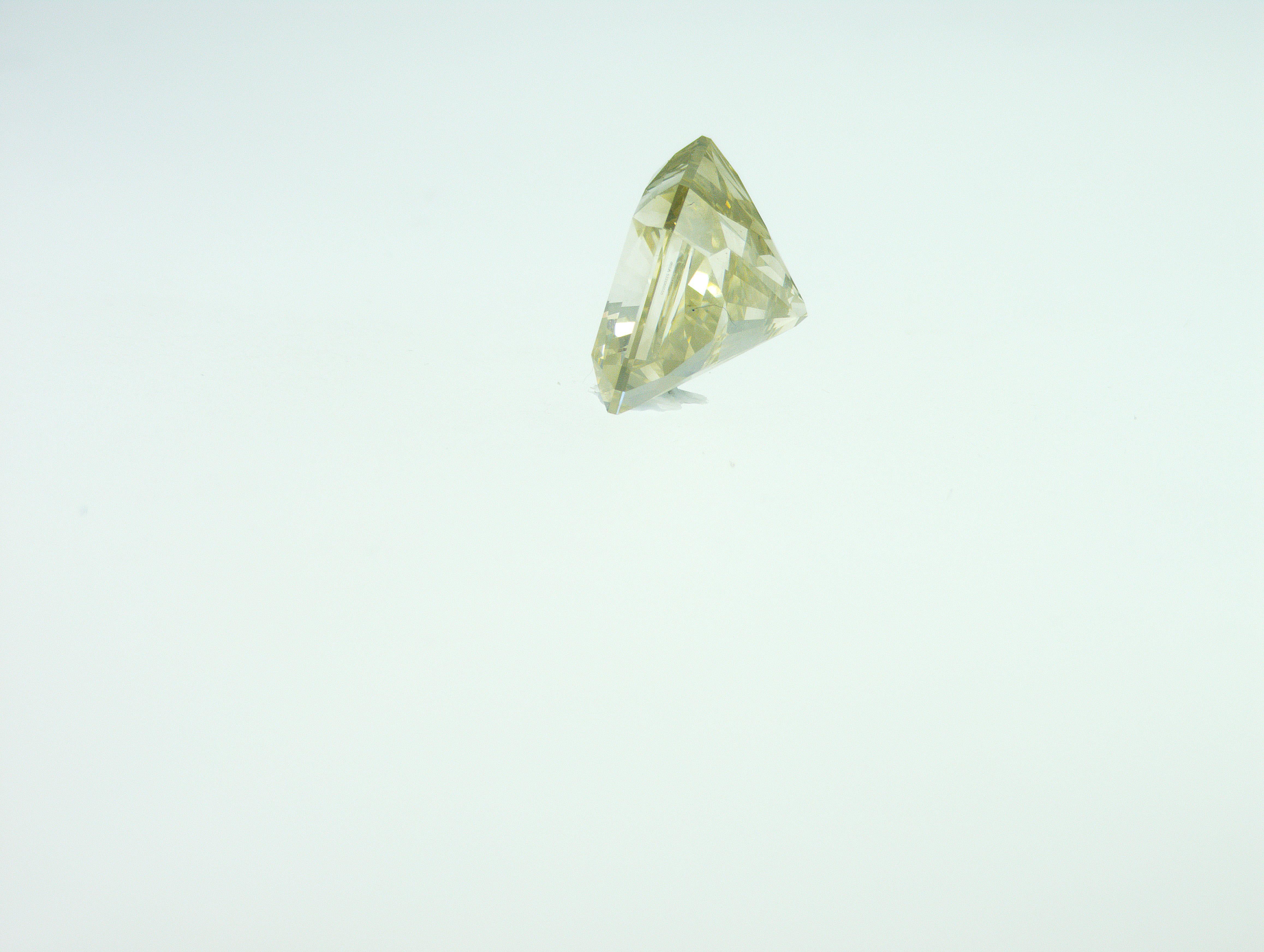 This is Wonderfull Yellow diamond with Olive tone will make you happy every day. It is really unique and natural. This diamond has been cut and polished in our production facility in Dubai. The diamond from Guinea rough diamond which was directly